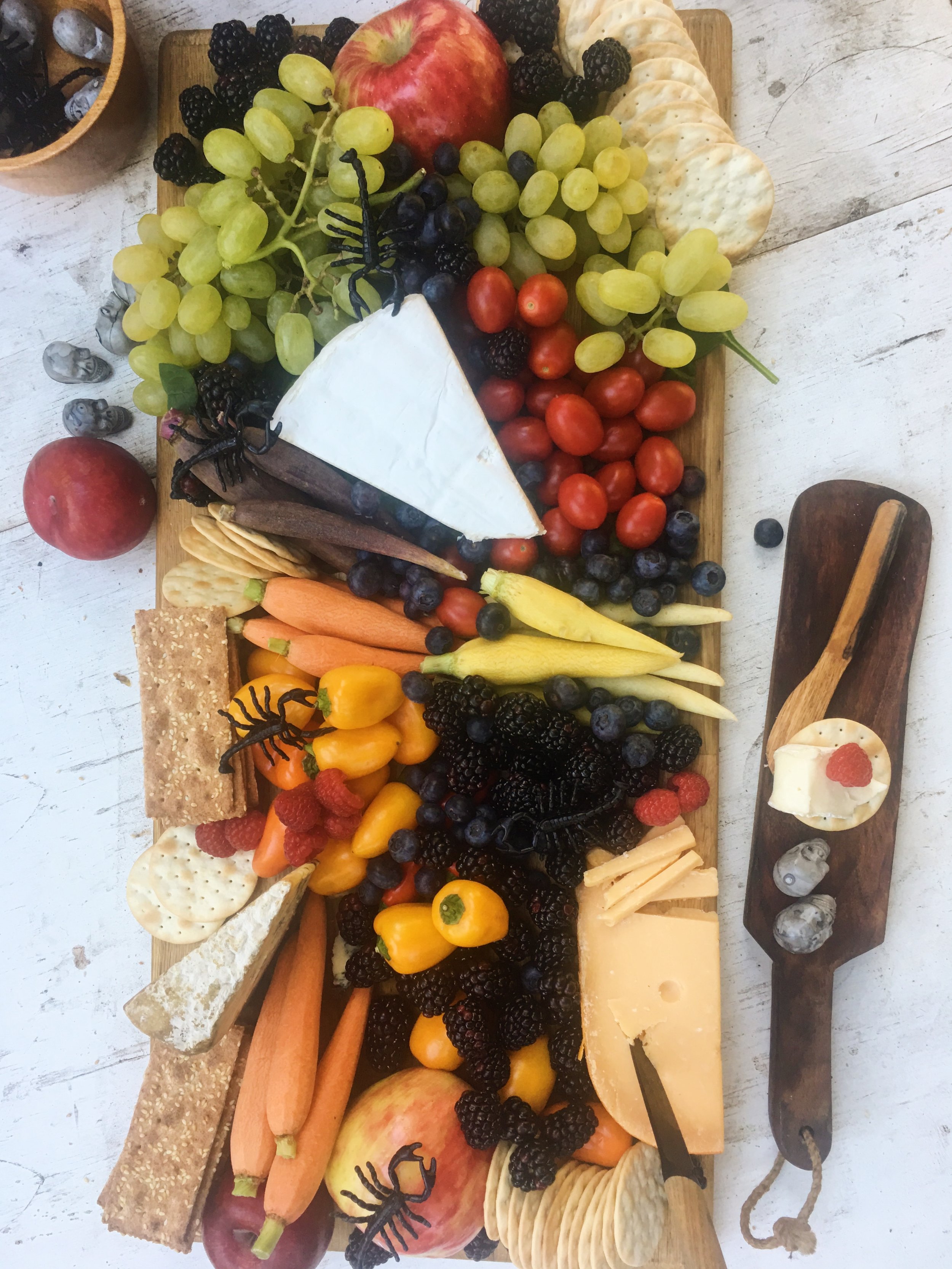 A classic cheese board full of delights. Be generous. Even a scorpion or two makes for a little variety (just kidding ... boo!)
