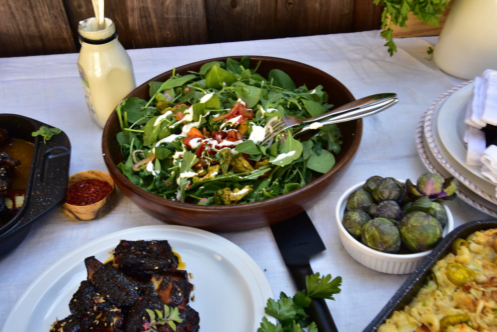A terrific salad, or slices of radish dredged in salt, can contrast the rich rib flavor. Just as the color red looks redder next to the color blue, your ribs can taste even more stinking delicious.