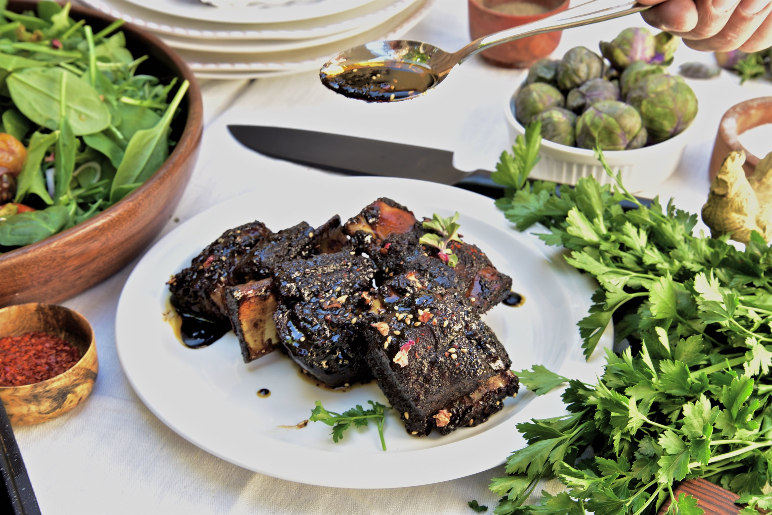 Dry rub ribs with a molasses chili paste glaze. It's even better than you might imagine.