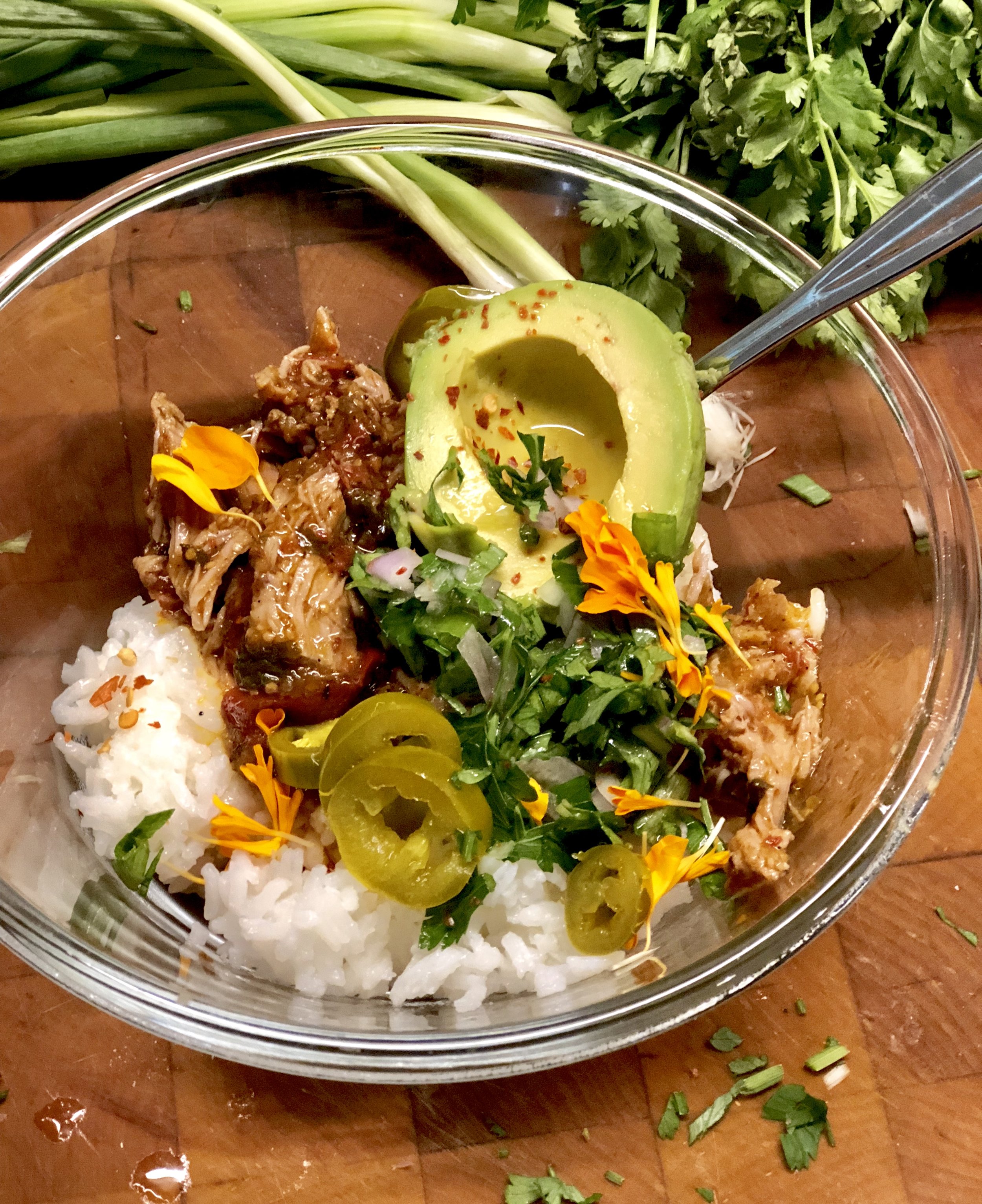 Serve it like this. People can choose the bite they're in the mood for. A bit of rice, a bit of pork. A spoonful of avocado with a bit of jalapeño. Every bite interesting.
