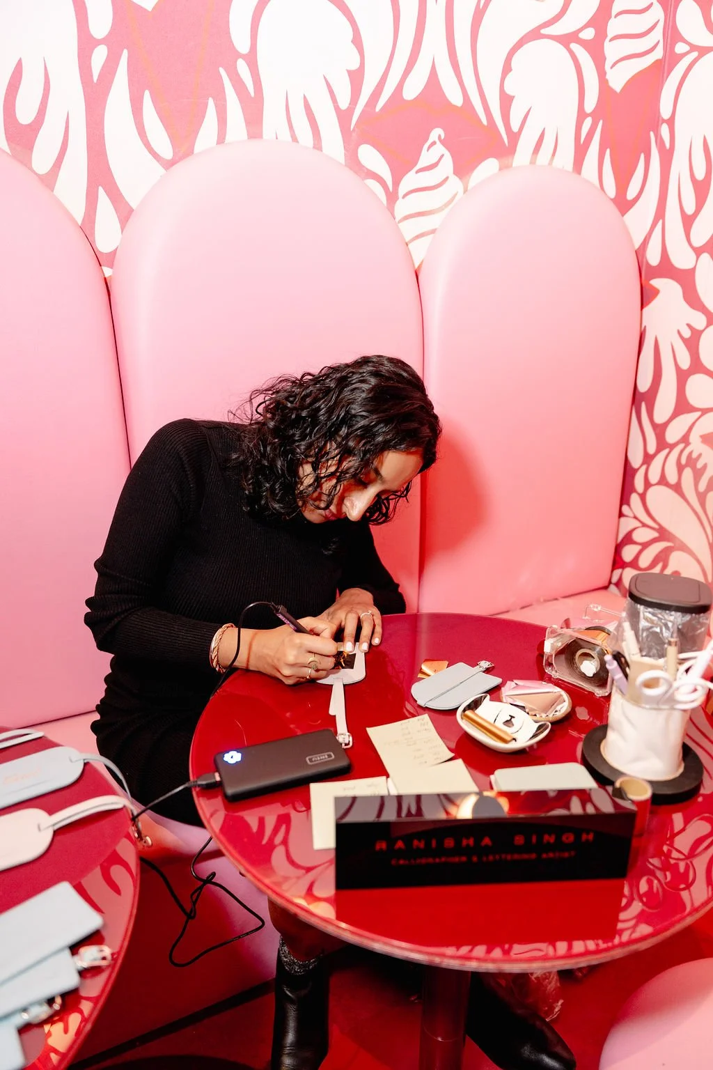 Hot foiling luggage tags for Questlove’s Black Elephant Party. Produced by Cat Darling Agency at the Museum of Ice Cream. Photo by Christian Germoso.