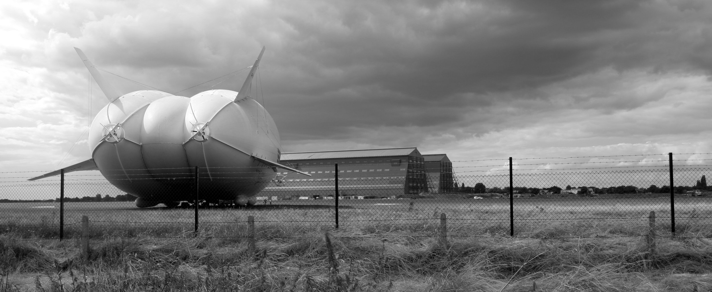  "  Storm clouds  "  The Airlander at Cardington  Limited edition of 100 prints signed and numbered  Comes complete with a neutral coloured mount ready for framing       