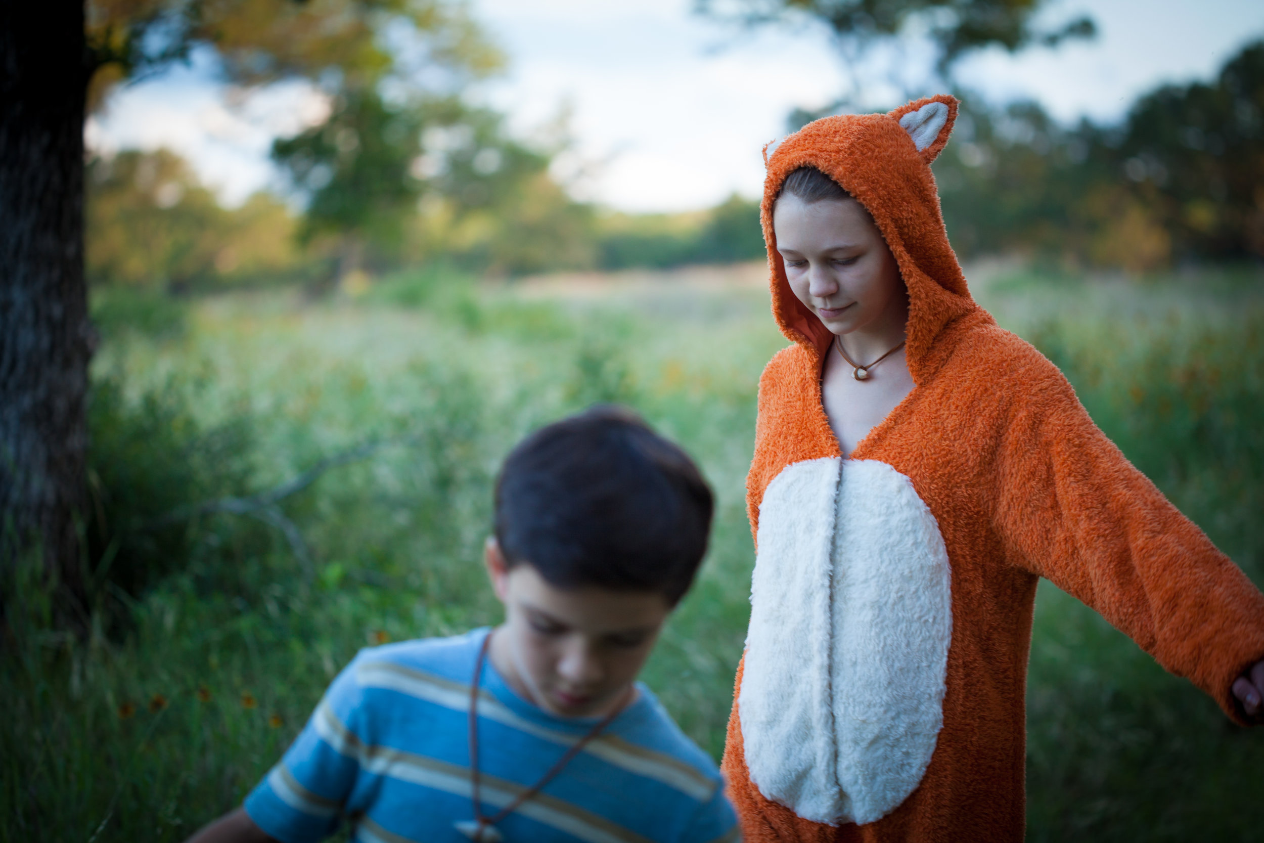 Felix the fox (Delaney Wingrove) follows Thomas (Bryce Gheisar) through the Who Knows forest : photo by Lisseth Lopez.jpg