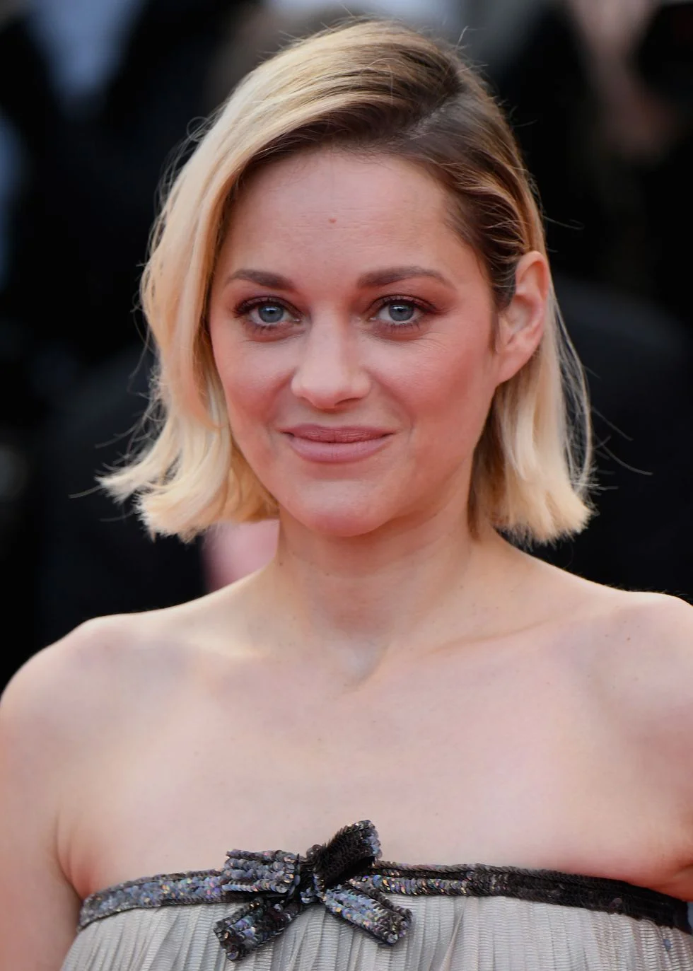BLONDE: Softly Contrasting Hair Marion Cotillard's surprise from brunette to blonde is sure to inspire others. What makes her switch different from other blonde makeovers? Soft brown roots and her still-dark brows. The intentional contrast is both pretty and convenient, as it will allow her hair to grow out with less maintenance.
