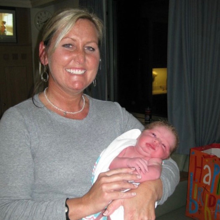  Jackie with the last baby she delivered to graduate from midwifery school&nbsp; 