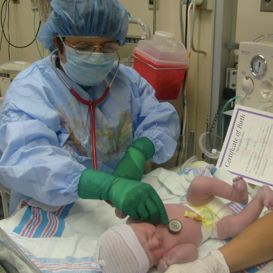  Dr. Rosenthal shows off one of her too-many-deliveries-to-count 