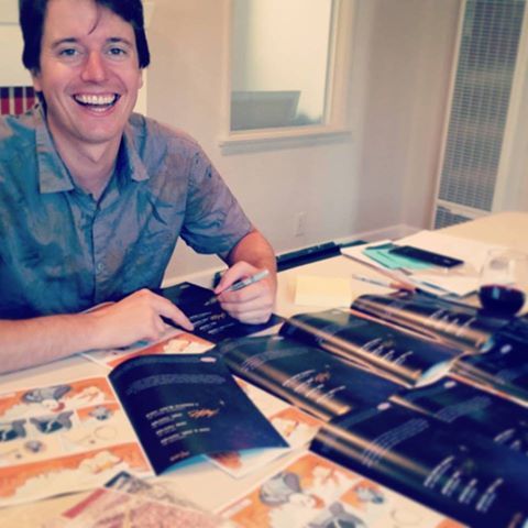 Joel and I signing all the copies!