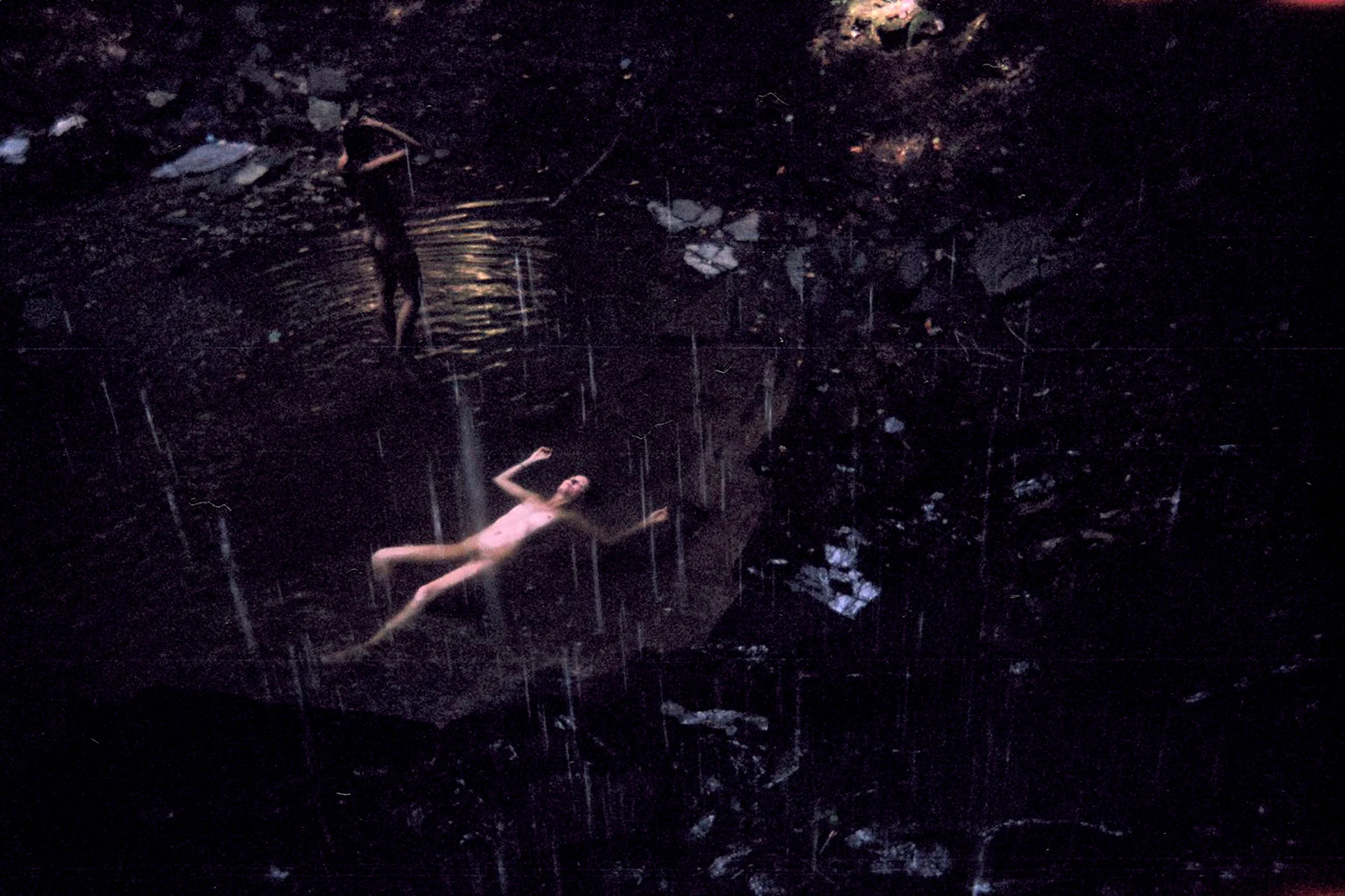 Rya and Benjy bathing in the rain in Tennessee, 2011