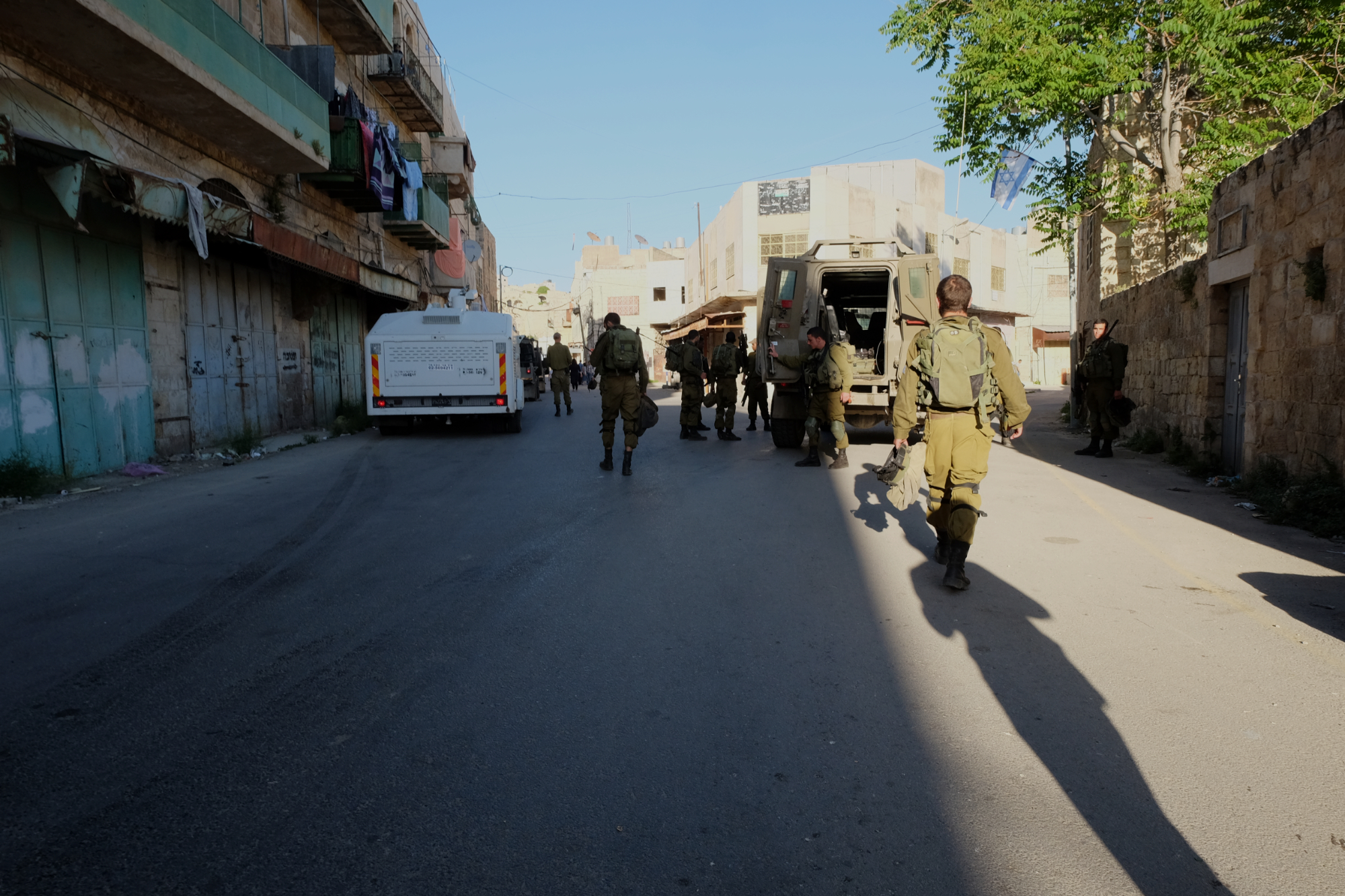 Soldiers patrolling an Israeli settlement in the Old Quarter of Hebron.