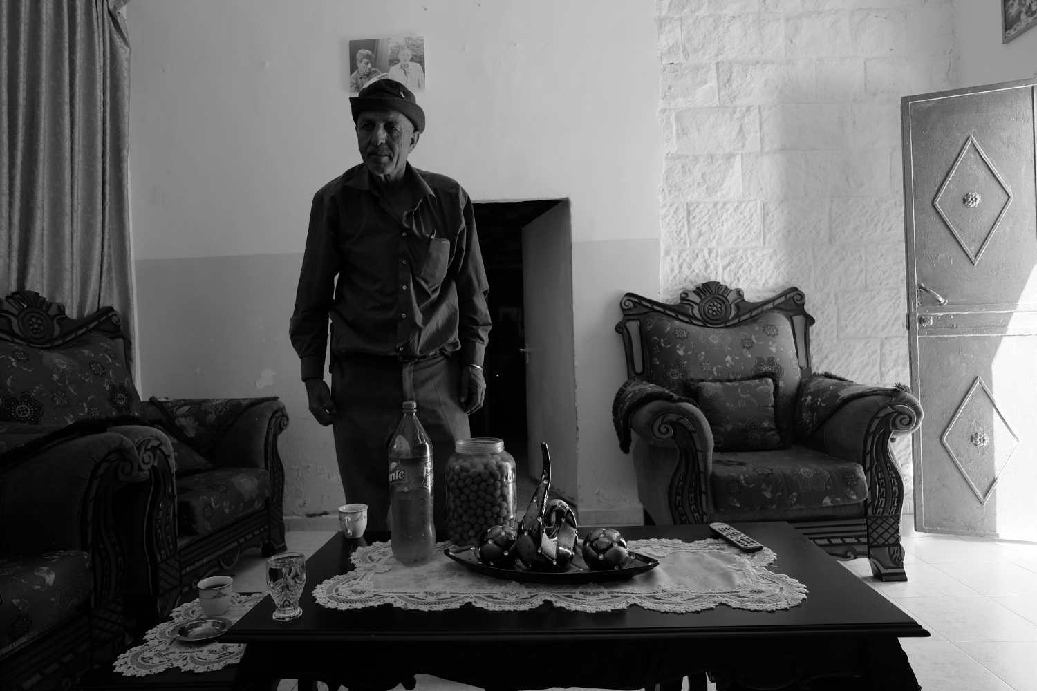  Mr. Abdalhade in his home in Burin explains how his son was recently arrested during a settler attack. "They (settlers) yell at us, this is the land of Israel, get out!” "It’s very hard because every year Burin is losing youth because we don’t have 