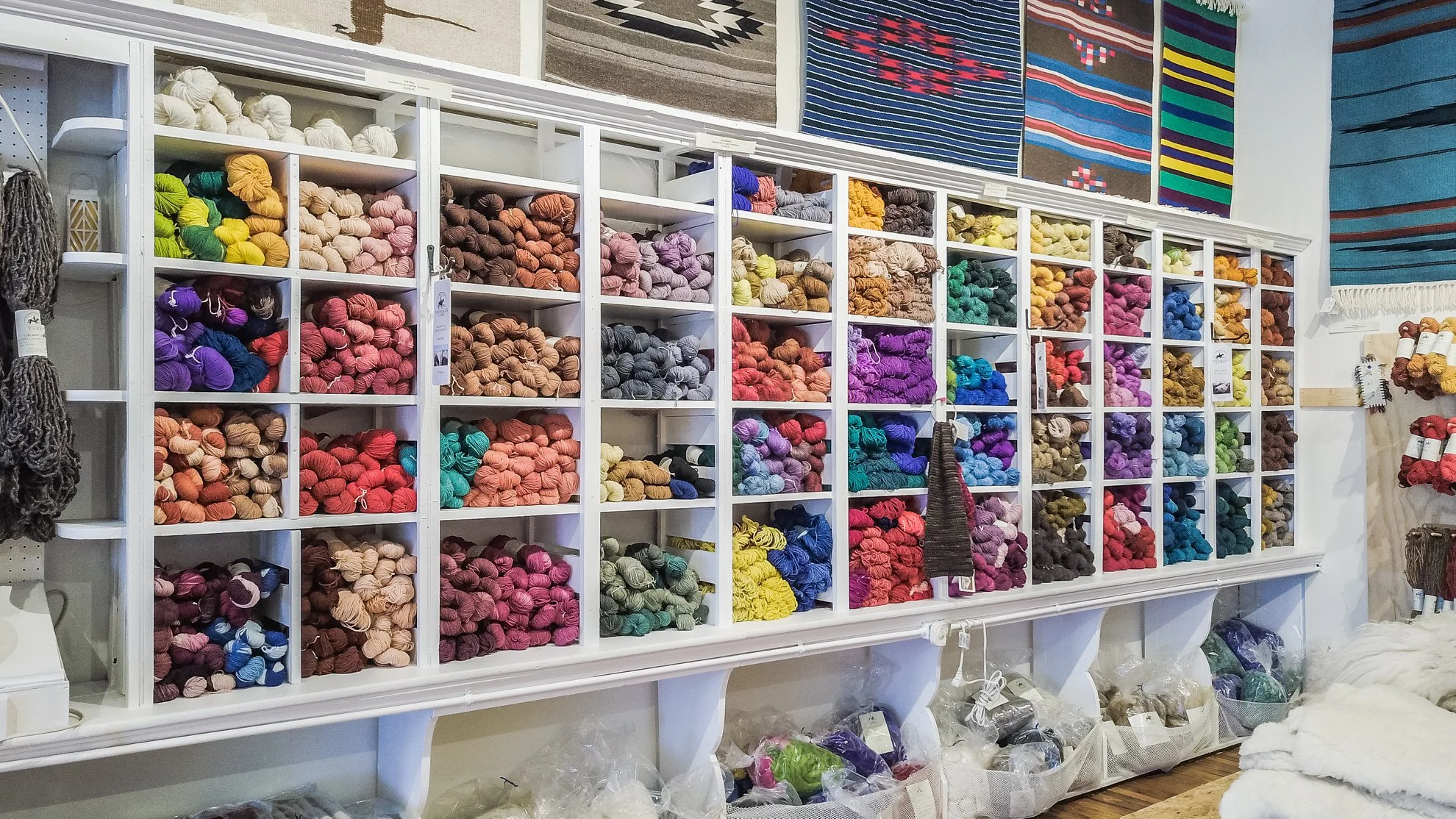 Yarns and weavings for sale at Tierra Wools. Photo by Dan Monaghan