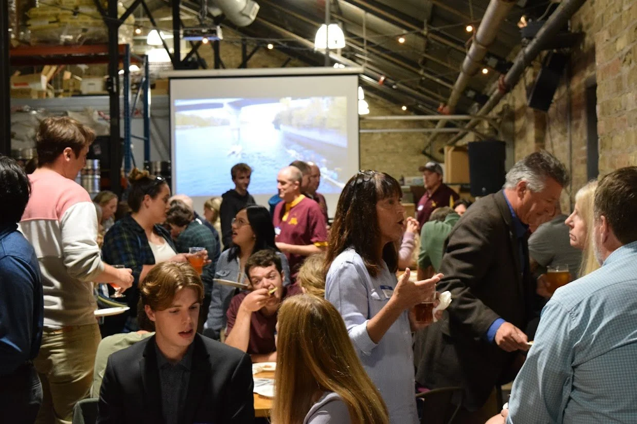 alumni at table picture.JPG