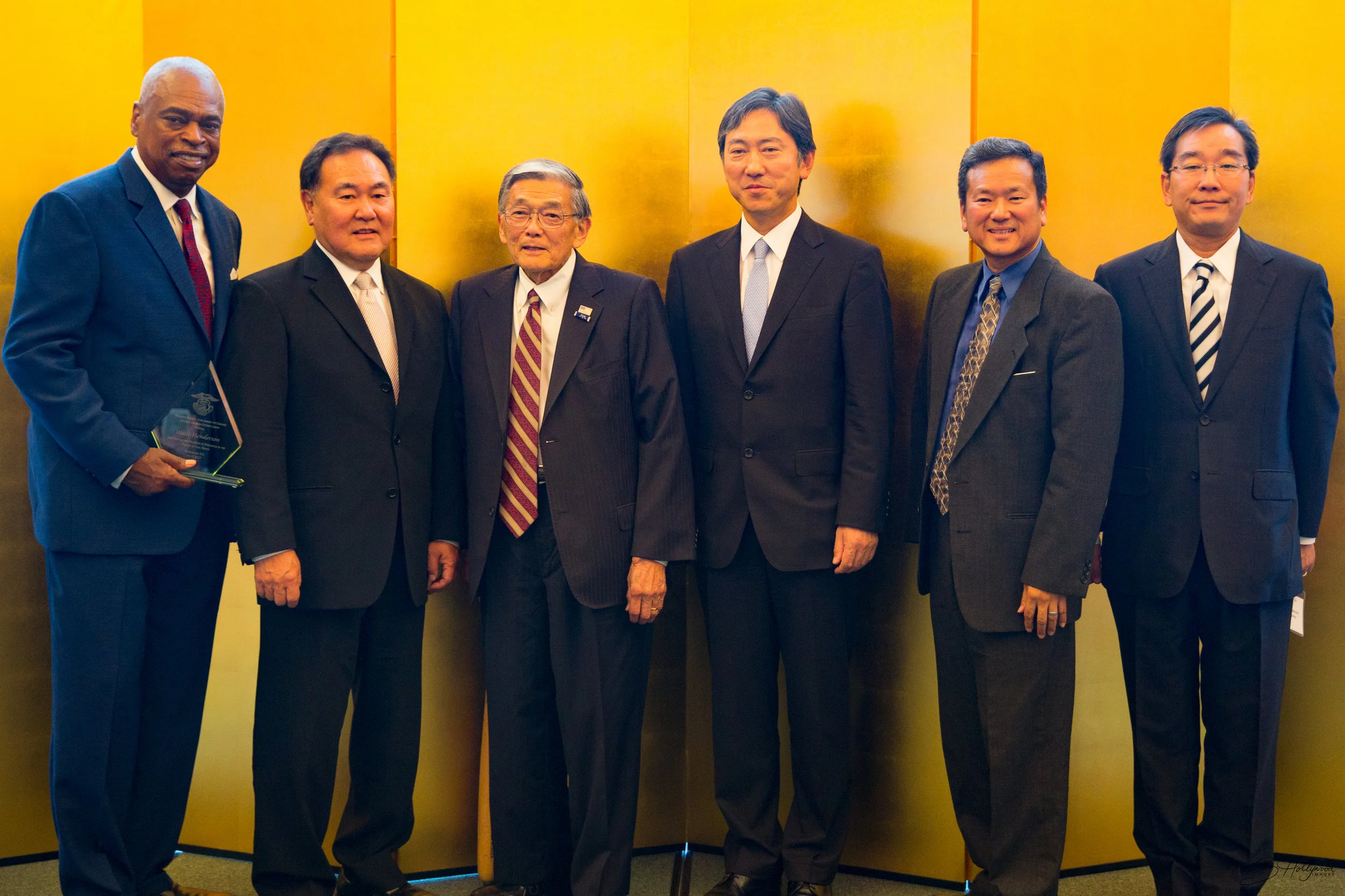 Awardees and dignitaries at the private reception hosted by the Embassy of Japan at the Ambassador's Residence. From left to right: Wade Henderson, Bill Yoshino, Secretary Norman Mineta, Embassy of Japan's DCM Oike, JACL National President Gary Mayeda, Embassy of Japan's Minister Sasayama.