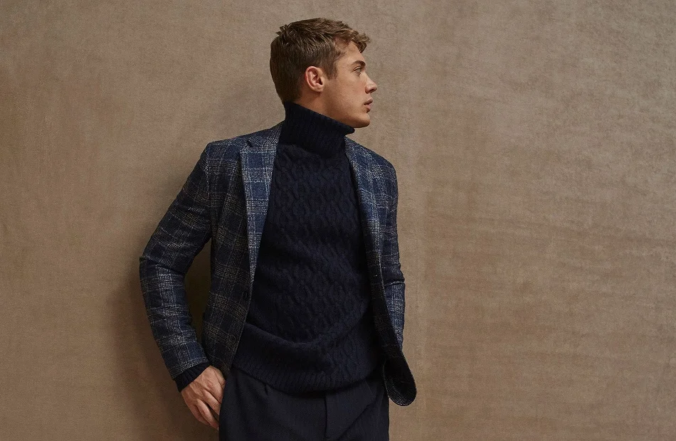 man wearing polo neck