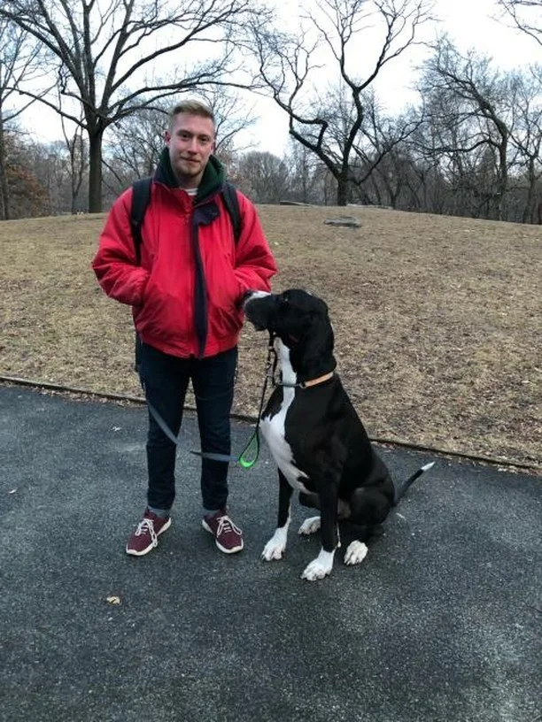 TAYLOR HAMILTON, DOG HANDLER & HOUND HIKES MANAGER A NATIVE NEW YORKER WITH A LOVE FOR BOTH DOGS AND THE OUTDOORS, IT WAS A NO-BRAINER FOR US TO BRING TAYLOR ABOARD TO TAKE HELP TAKE CARE OF YOUR DOG! HE'S ALWAYS ON A NEW ADVENTURE BE IT HIKING, CAMPING WITH FRIENDS, FISHING, OR OUT WITH HIS OWN DOG WHEN HE HAS SOME FREE TIME. GIVEN THAT, HE'LL ALWAYS ENJOY BEING WITH YOUR DOG WHETHER HE'S WALKING THEM THROUGH CENTRAL PARK OR TAKING THEM ON A HOUND HIKE IN ONE OF THE MANY BEAUTIFUL TRAILS IN THE TRI-STATE AREA. HE'S HAD DOGS FOR THE MAJORITY OF HIS LIFE SO CARING FOR THEIR NEEDS BE IT, EXERCISE, TRAINING OR JUST PLAIN OLD SOCIALIZATION HE'S ALWAYS UP TO THE TASK!