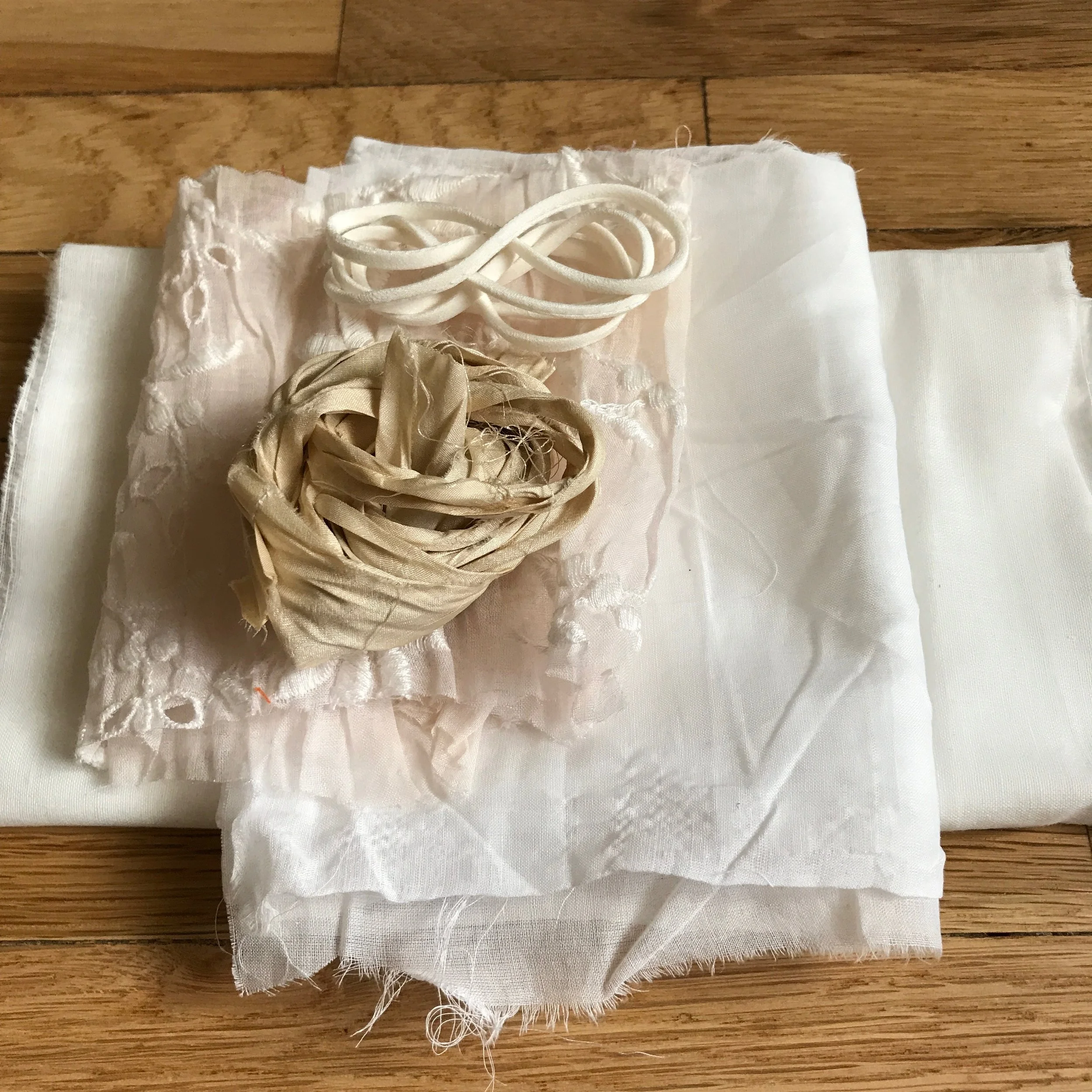1. Decide what fabric you want to dye. I chose a light cotton, some muslin, a wide piece of lace, some recycled silk strip and some new silk cord.