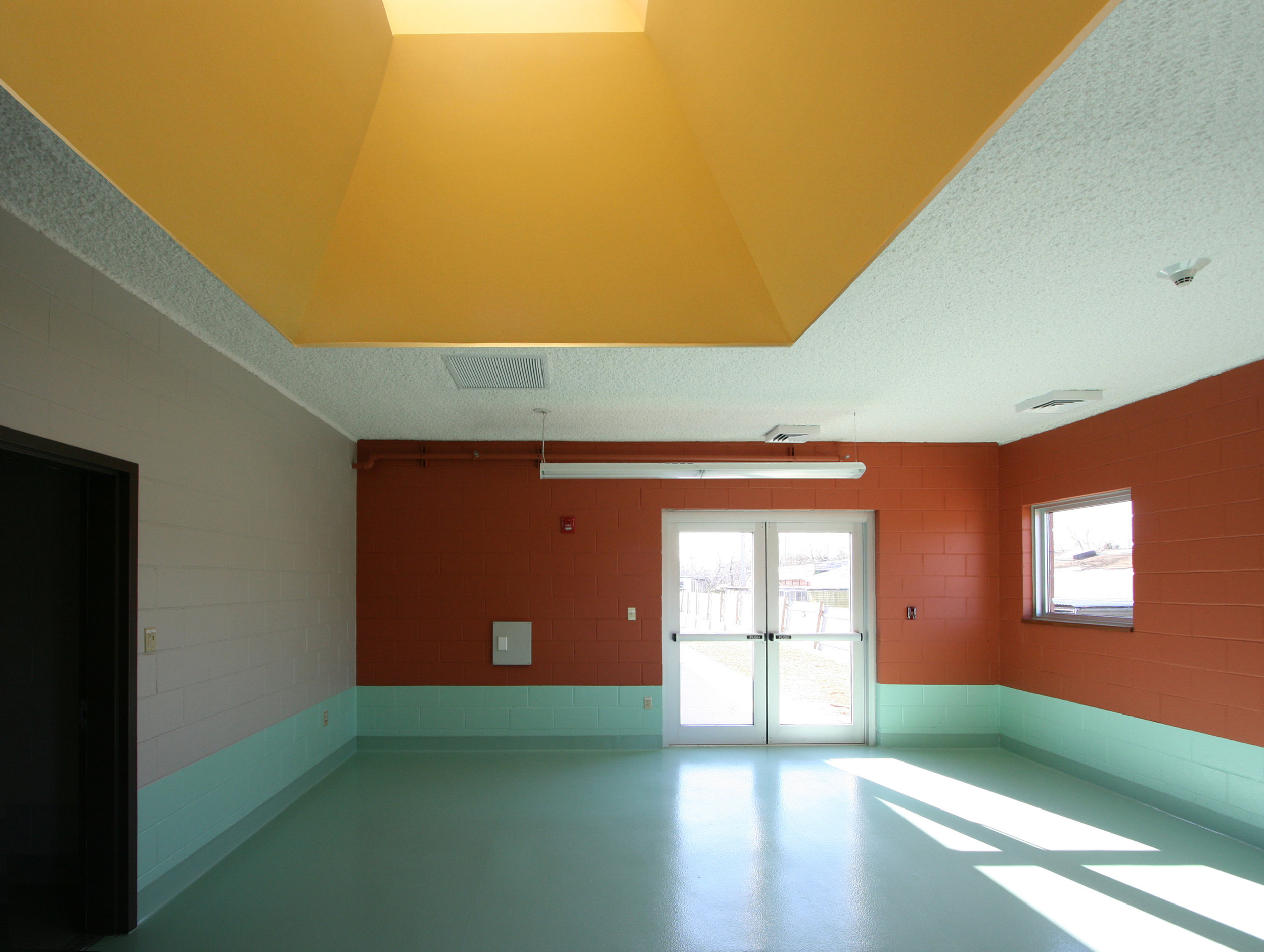  Room under colored skylight well 