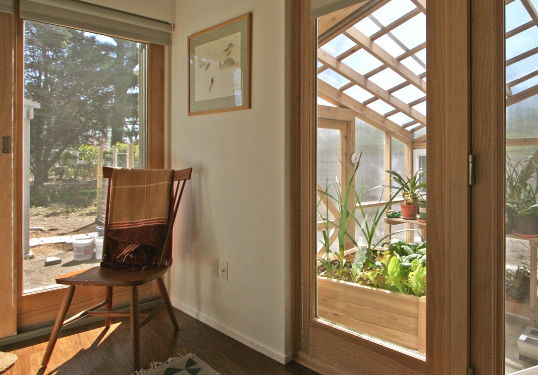  Attached Greenhouse adds intermediate space 