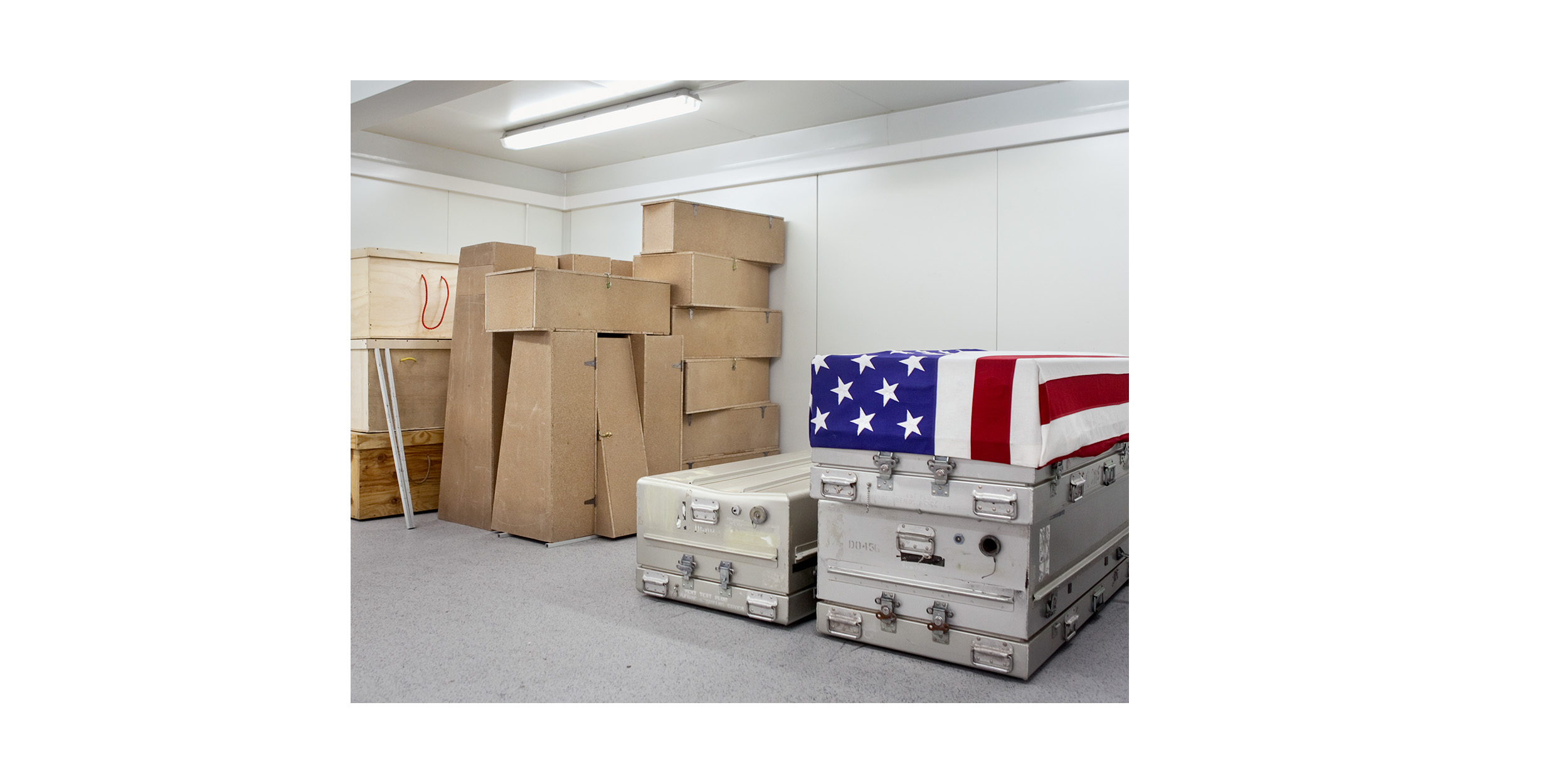  Stacked in a small room at the Mortuary Affairs Collection point in Kandahar Airfield are the transfer cases for civilian adults (left), &nbsp;children (centre) and US soldiers (right).&nbsp;During a 24-hour span, a mortuary affairs team can process