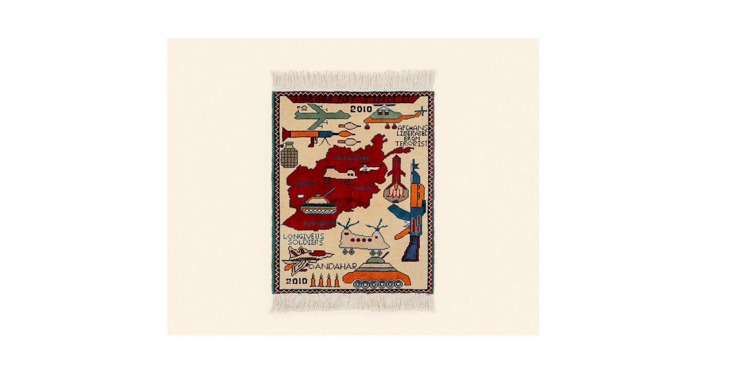 A handmade Afghanistan war rug sold at Kandahar Airfield's weekly bazaar. The bazaar was introduced so coalition troops could shop from local traders within the safety of the base, and to provide a small cash injection to the local economy. The vendors sold many items, from counterfeit DVD's, jewelry, daggers, traditional clothing to crafts. 