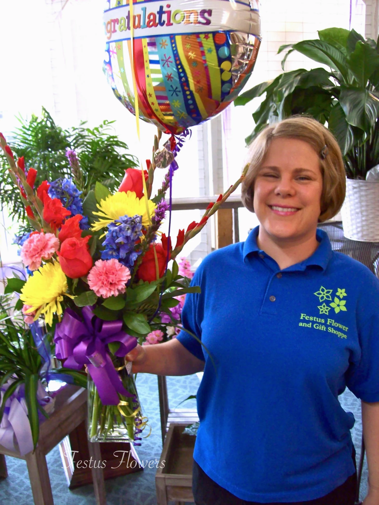 Charlotte with Congrats balloon and vase.jpg