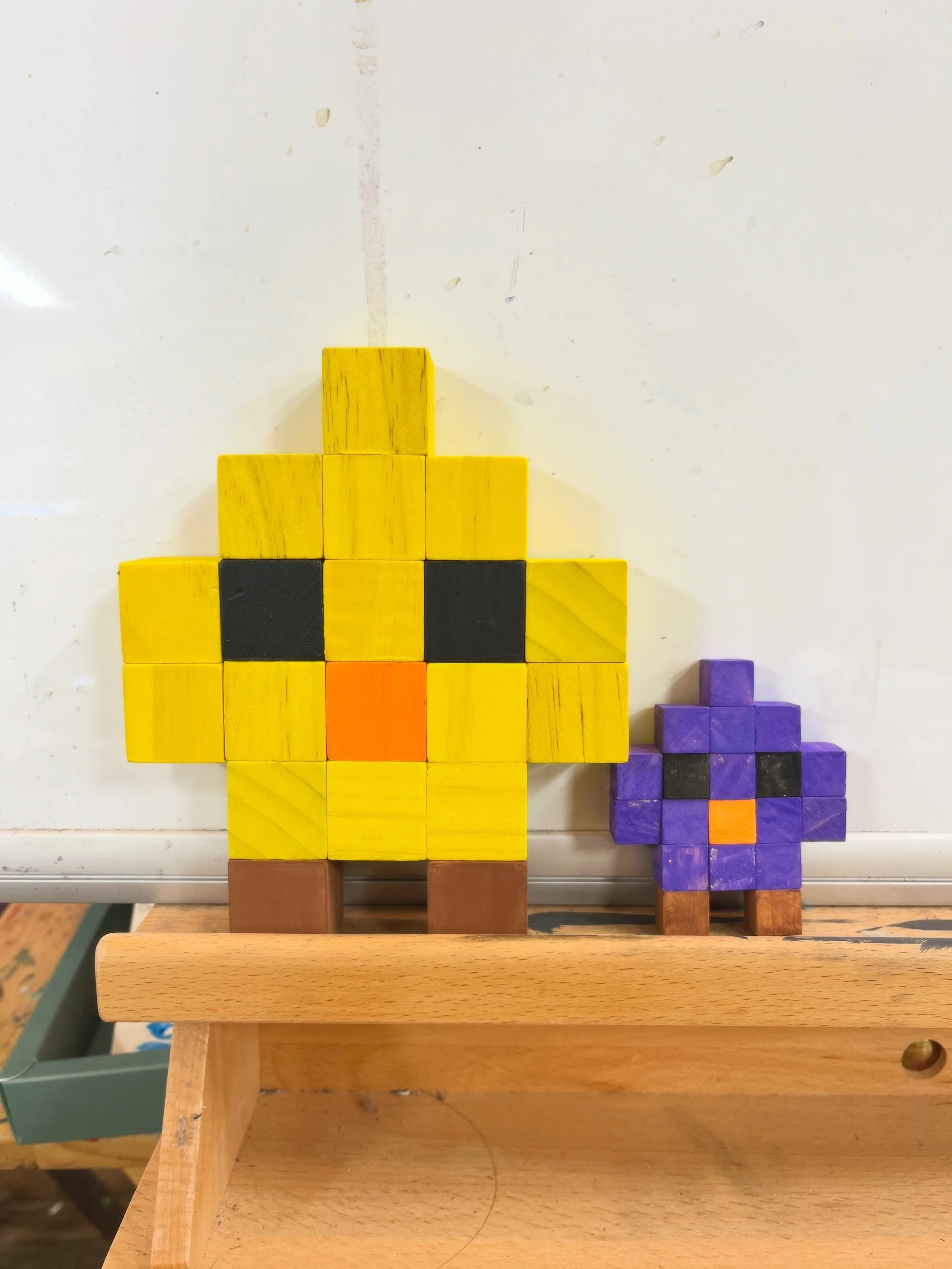 Thank you for the great first week at spaceIN Summer Art Camp! 🐥🍎

We built a real life pixel art using wooden blocks and paints. They were all looking fun and amazing at the end!