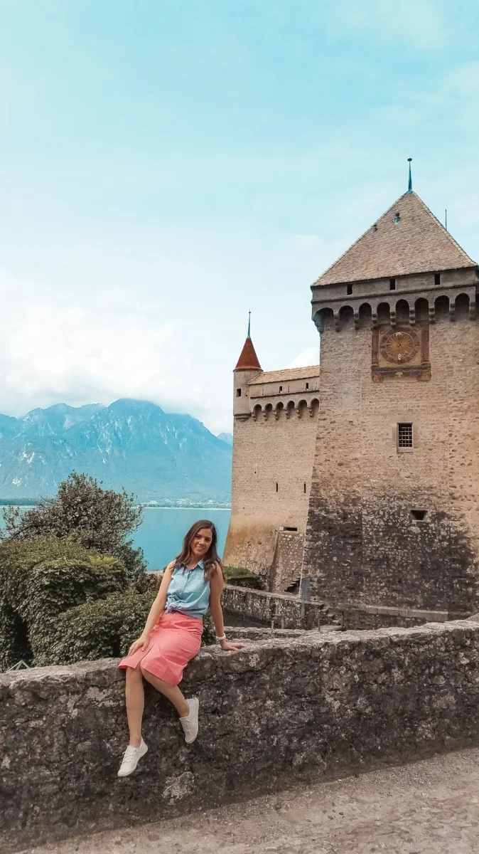 Montreux's Chillon Castle is a gem on Lac Lemon, Switzerland. You can go inside or simply enjoy the lake and mountain views from here. #Travel #Switzerland #VisitSwitzerland #Wanderlust #Travelblogs #Lifestyleblogs #Castles #Europe