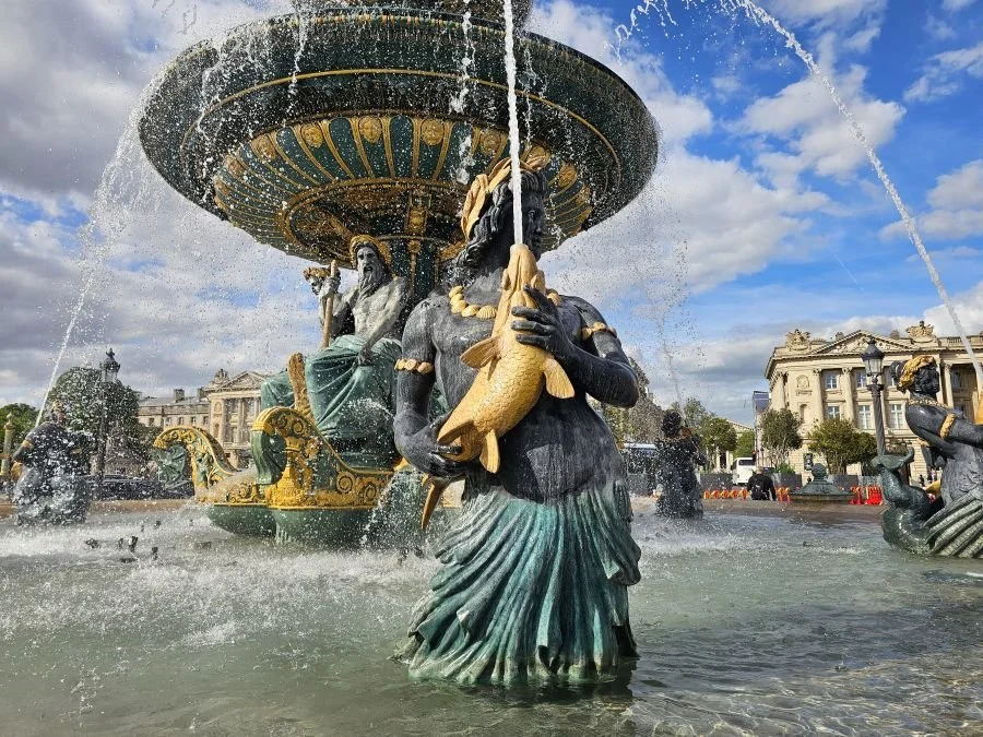 This bucket list Paris site includes a fountain with statues and gold details