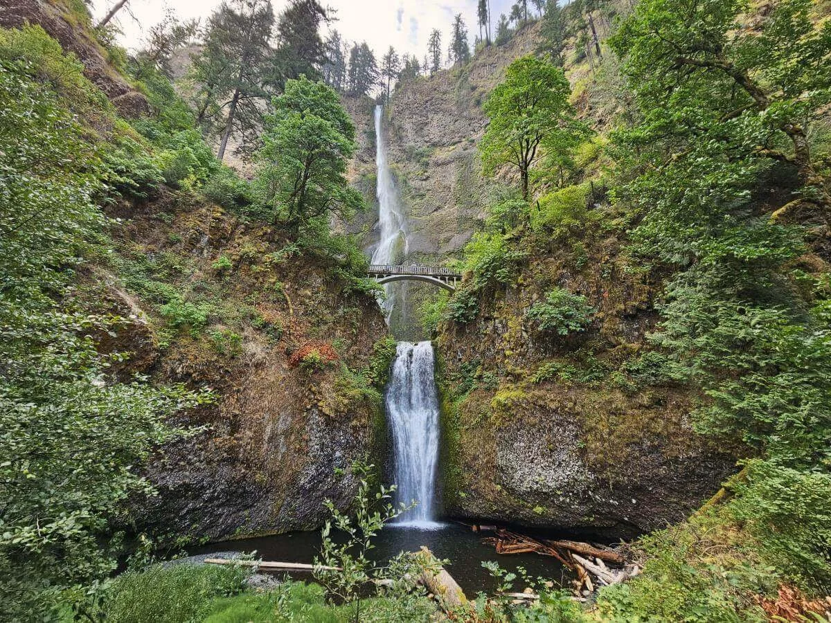 A two-tiered waterfall with a bridge in the middle in the Columbia River Gorge on an Oregon road trip