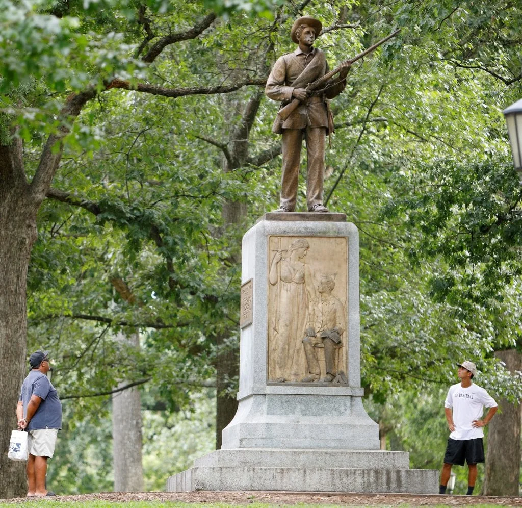 The Silent Sam monument before it was removed earlier this fall ( source )