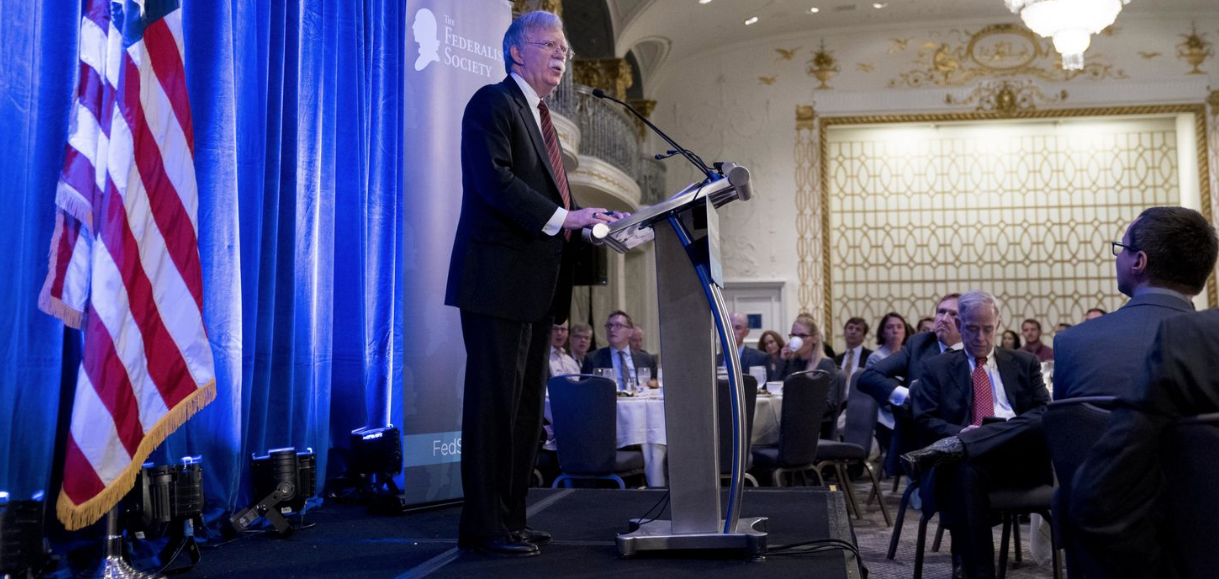 National Security Advisor John Bolton addressing a gathering of the Federalist Society in September ( source )