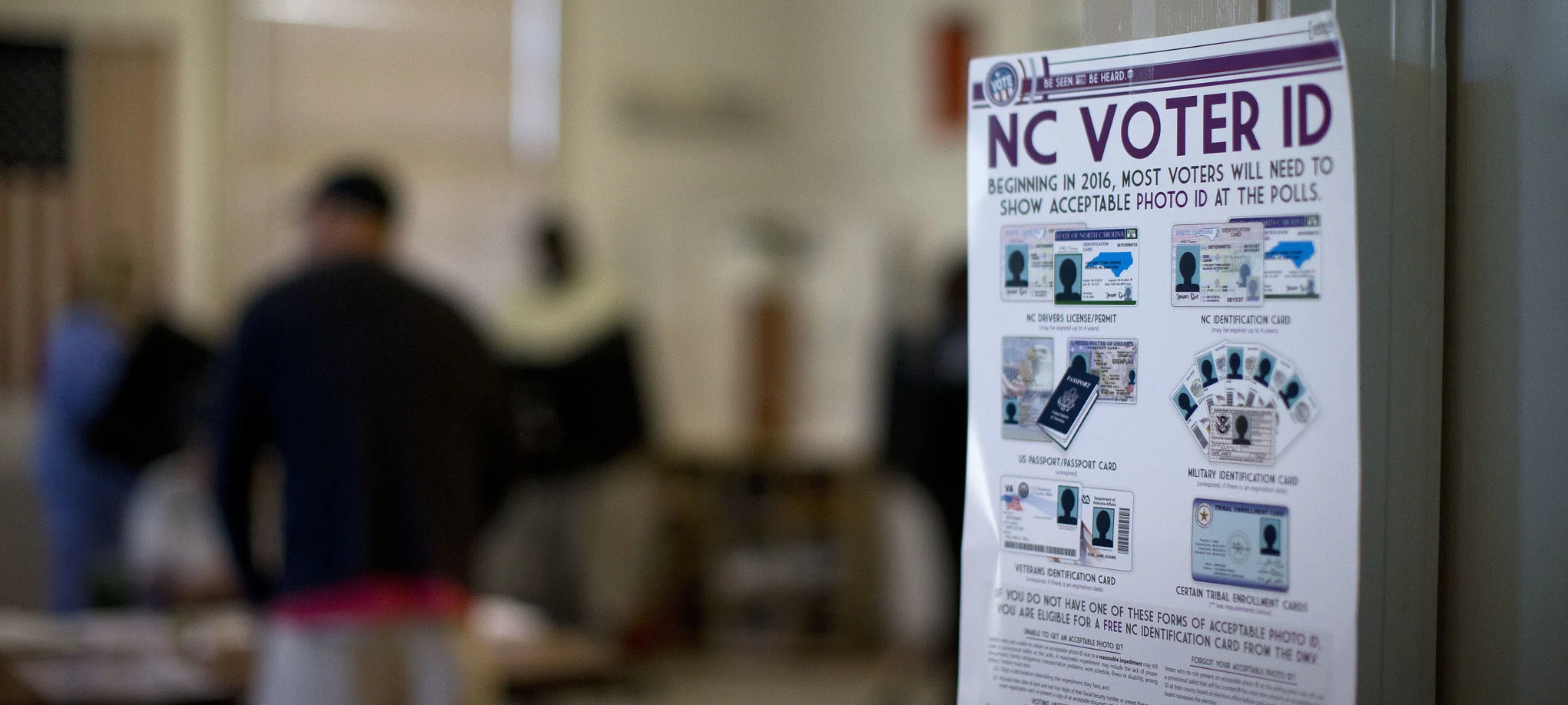 A poster listing voter identification requirements at a North Carolina precinct ( Image )