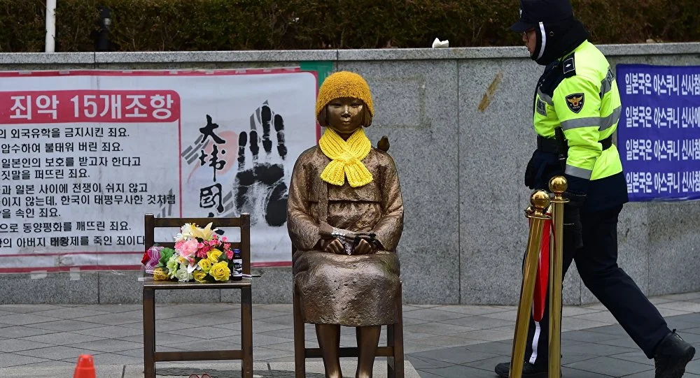 The Statue of Peace dedicated to the comfort women of World War II facing the Embassy of Japan in Seoul, South Korea ( Image )
