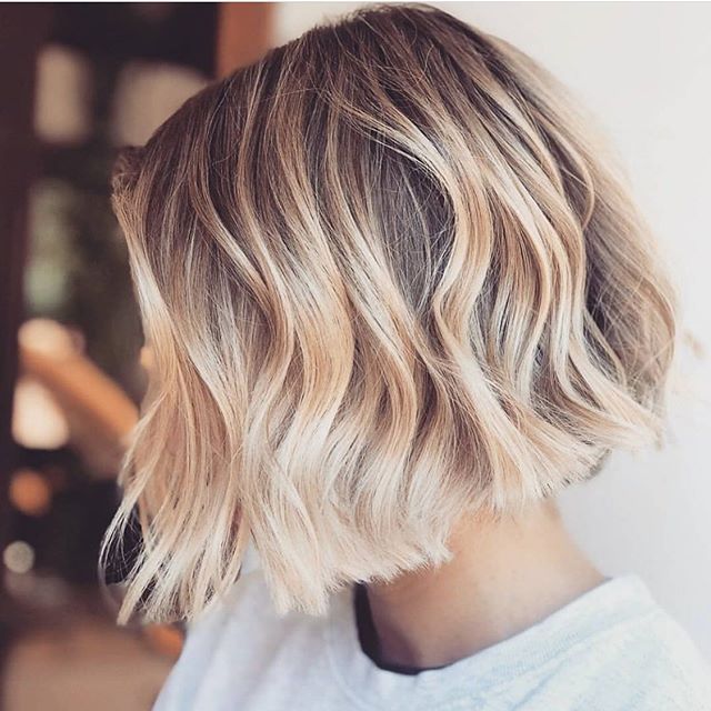 Ice ice baby! This gorgeous ice blonde blowout by the artists at @bondiboost has us seriously considering a chop &amp; color 😍😍😍 #nationalblowoutday