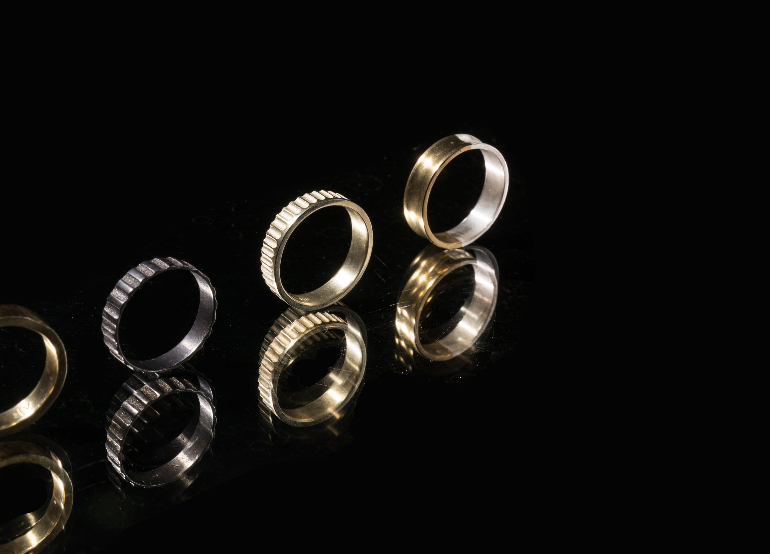3 and half rings on mirror.jpg