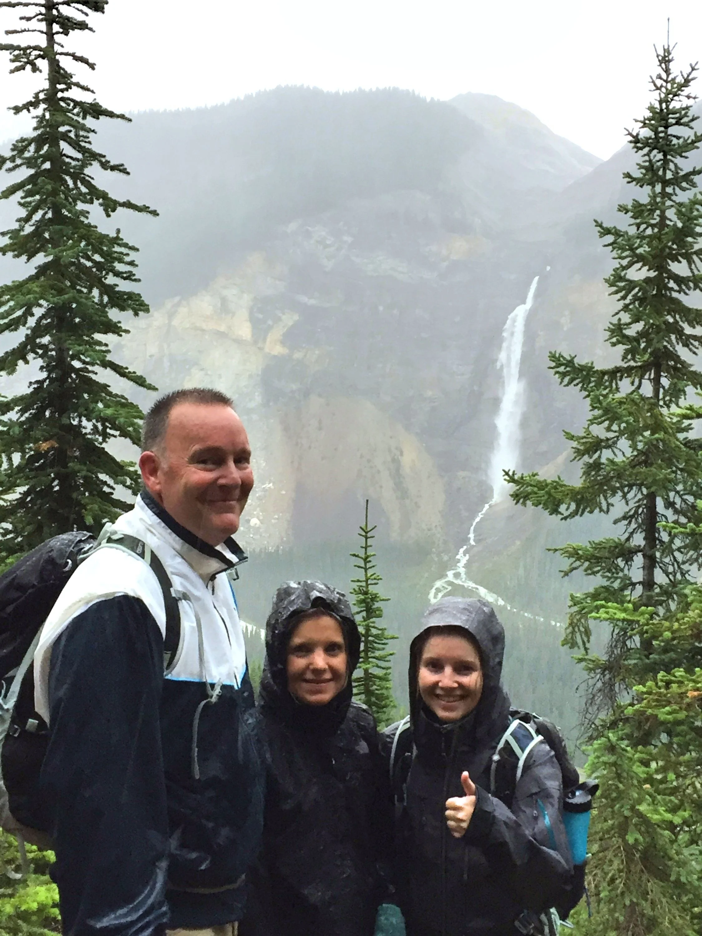 Not the greatest picture of us, but I think it shows how happy we all were to be caught in the rain. 