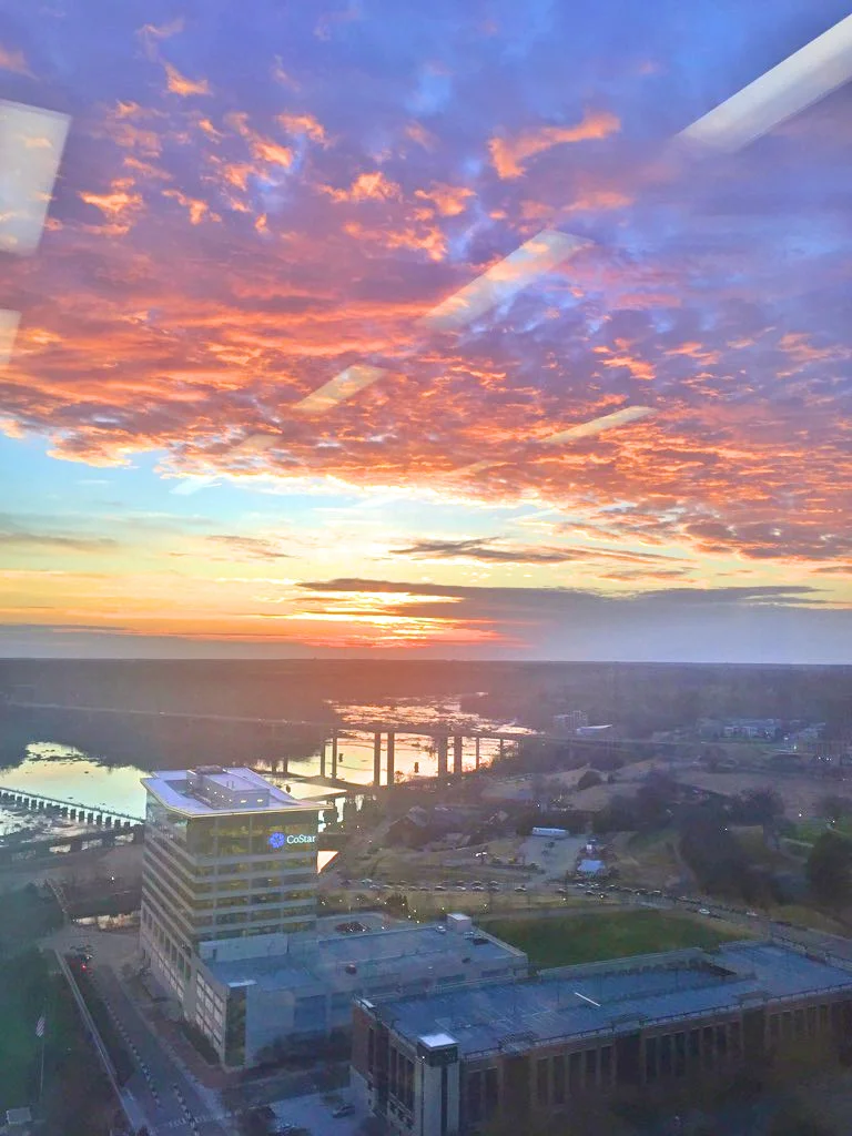 Walking stairs at work, rewarded with a view from the top of the building!