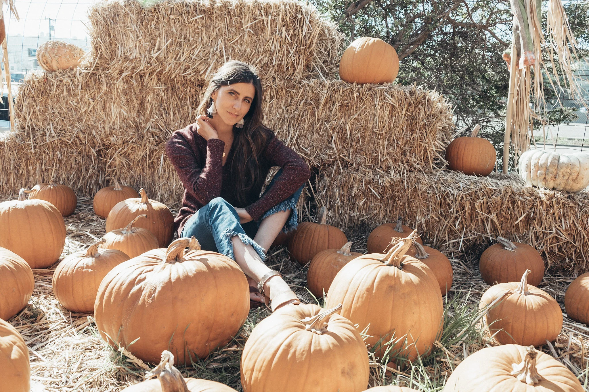 I’m wearing the Boucle Vee Sweater by Margaret O’Leary, Zaful fringed jeans and Bedstu platforms.