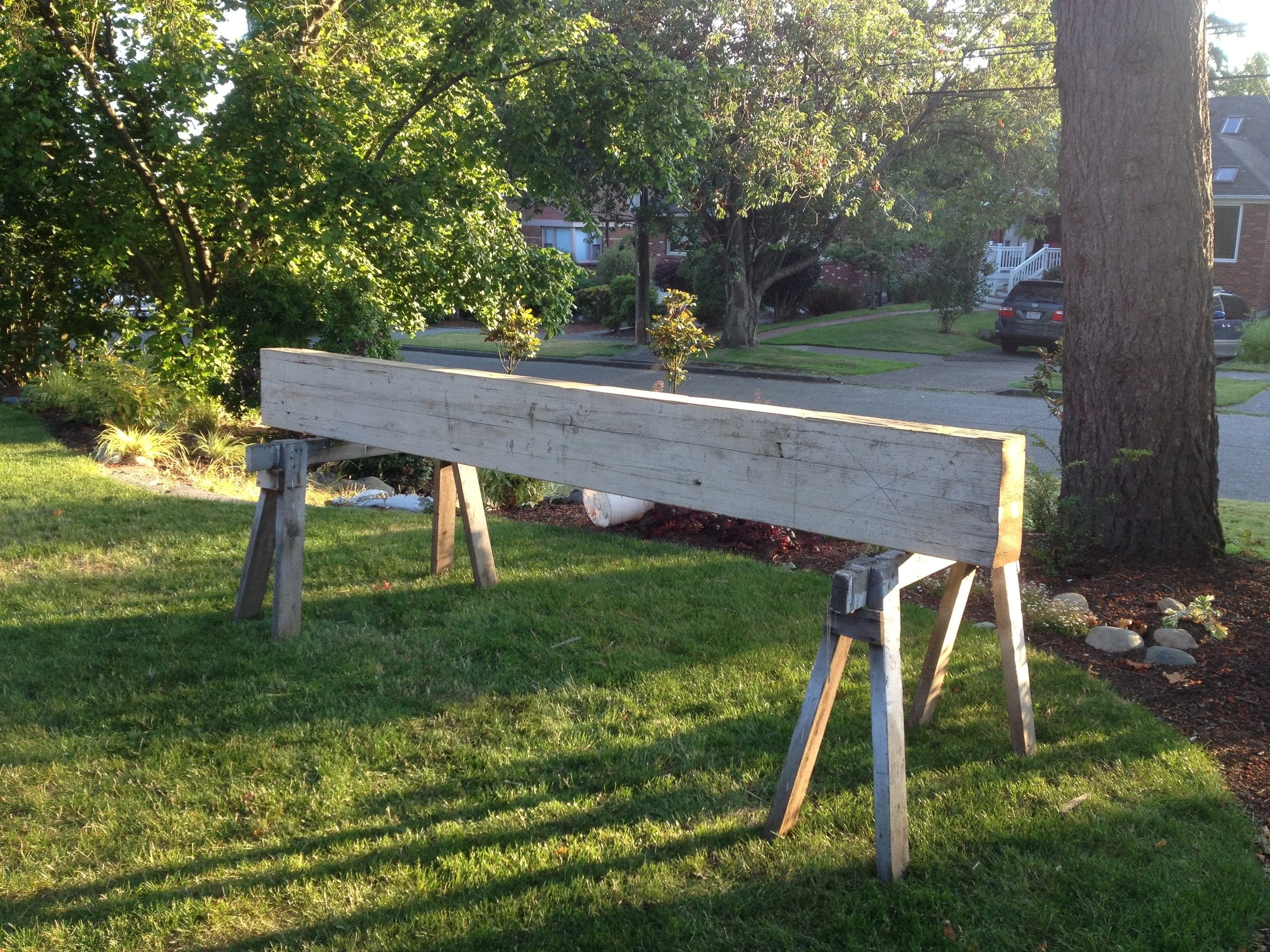 a glue-lam beam reclaimed for the purpose a support leg