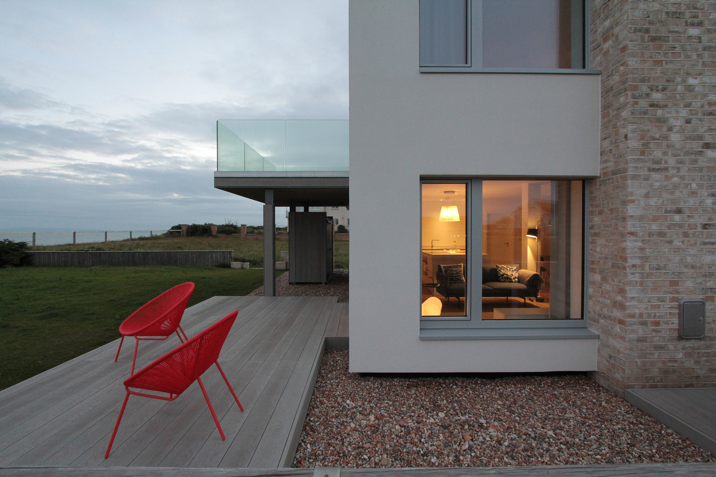 BreakPoint 'Marram' img19 - Evening View of sea-side garden terrace towards sunset.jpg