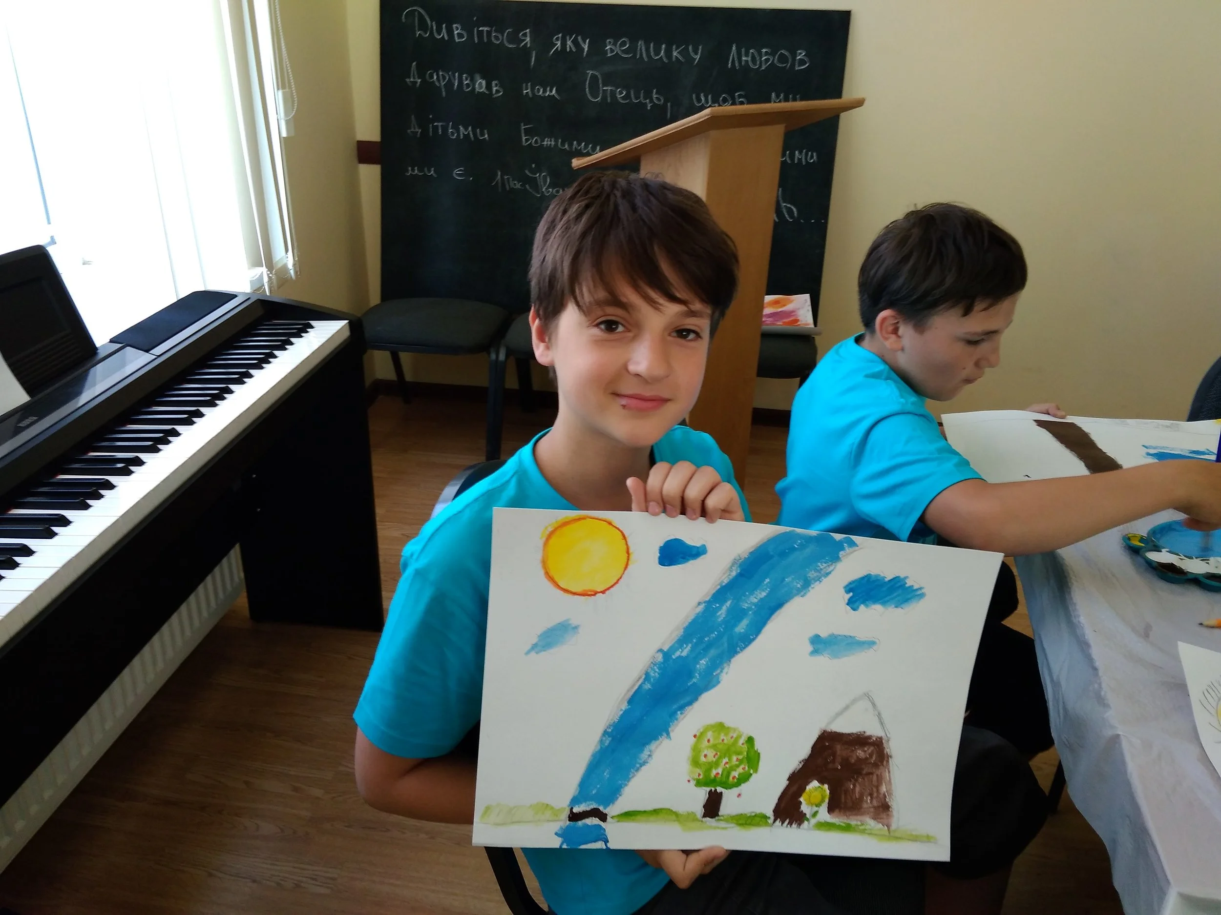 Proud of his artwork!