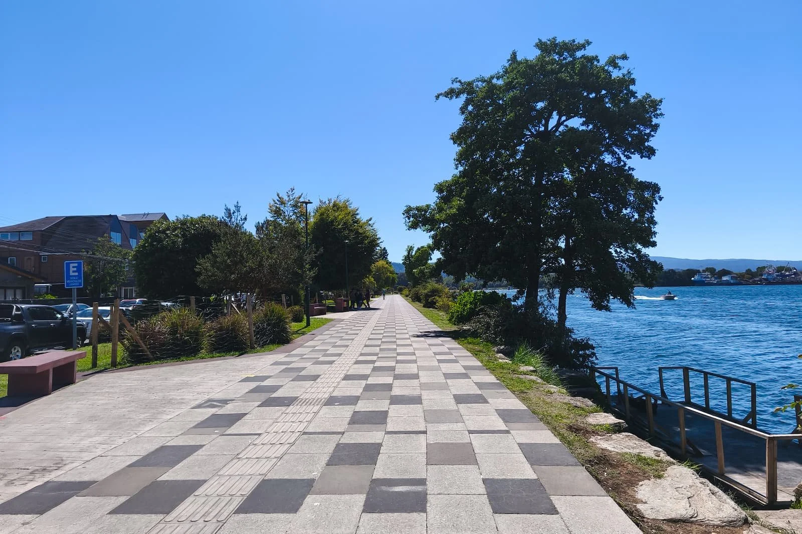 Quiet northeast Costanera waterfront walkway in Valdivia Chile with river views