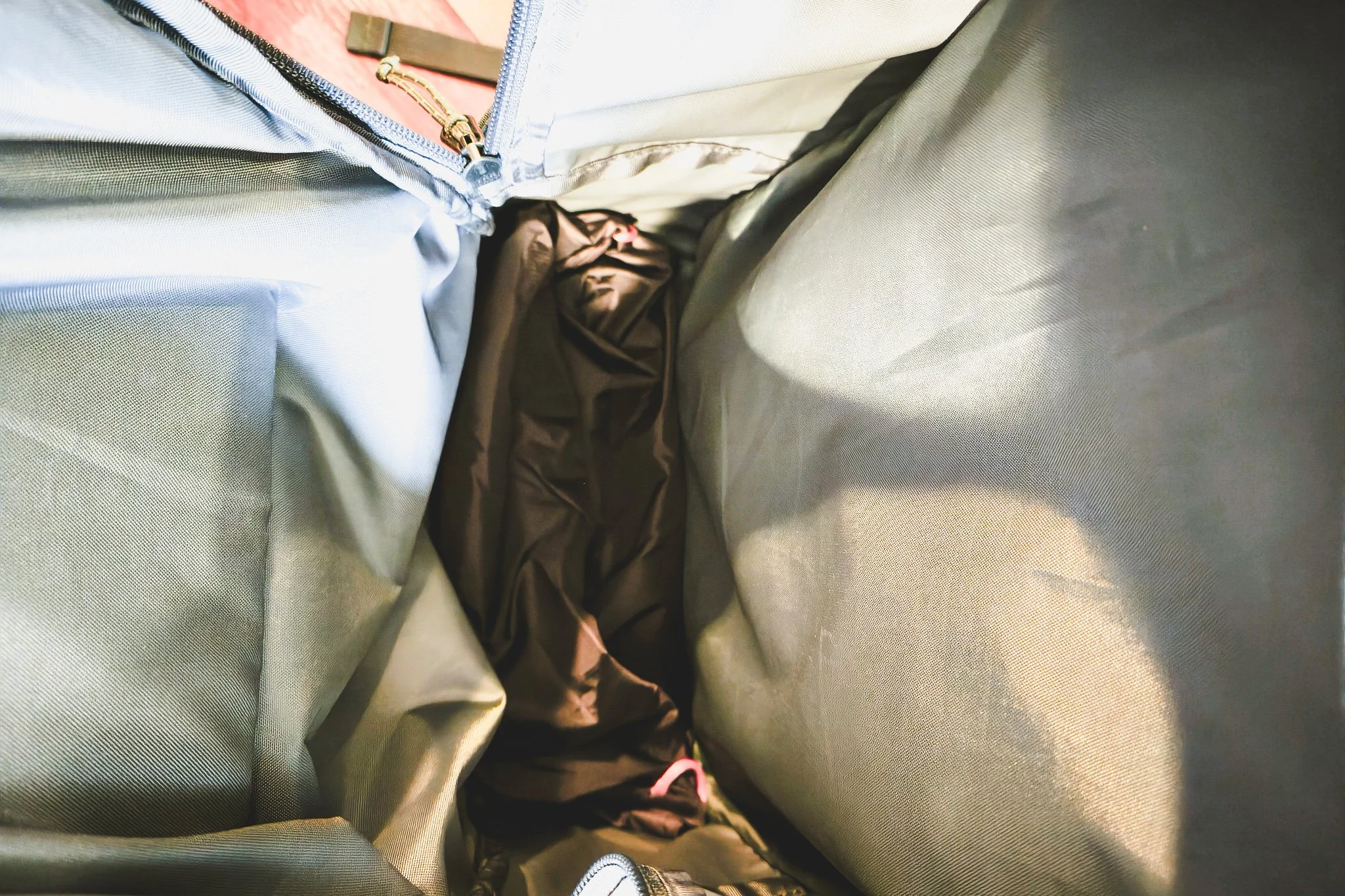 Shoe bag goes on bottom of main compartment