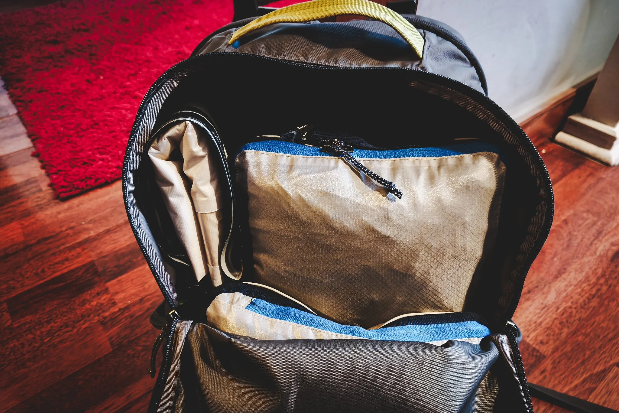 Folded laundry wash bag goes top left