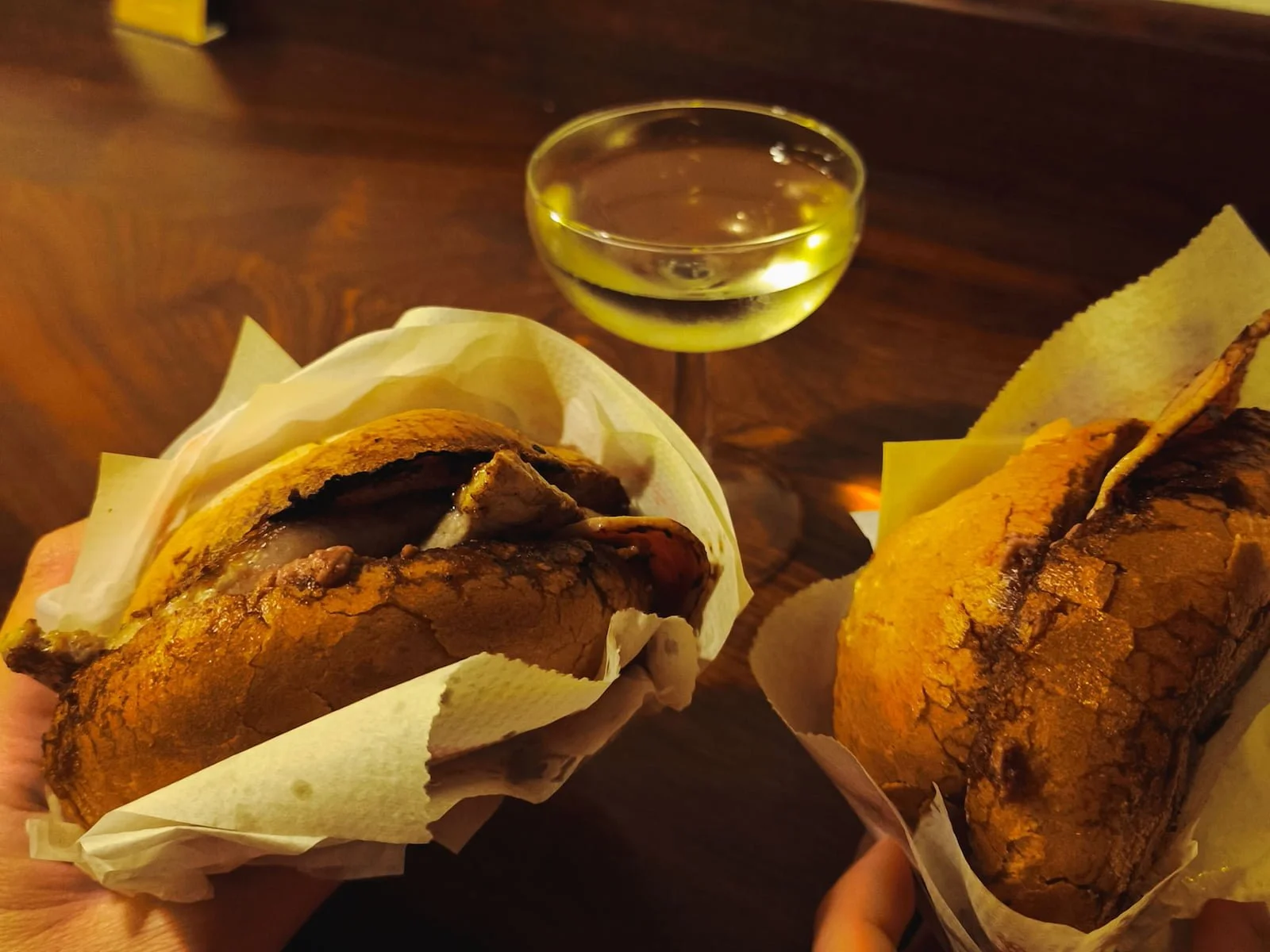 Two sandwiches and a glass of cava at Can Paixano in Barcelona