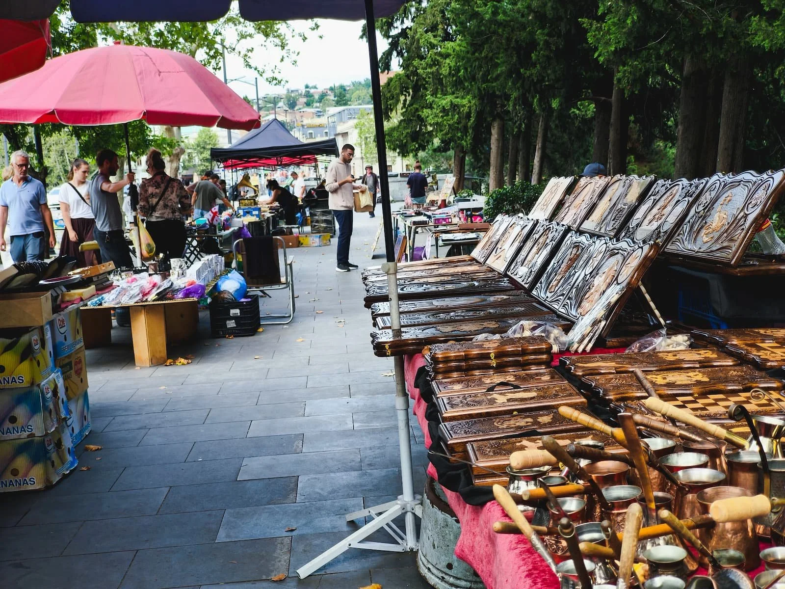 Vendors selling antiques and Soviet-era objects at Dry Bridge Market in Tbilisi