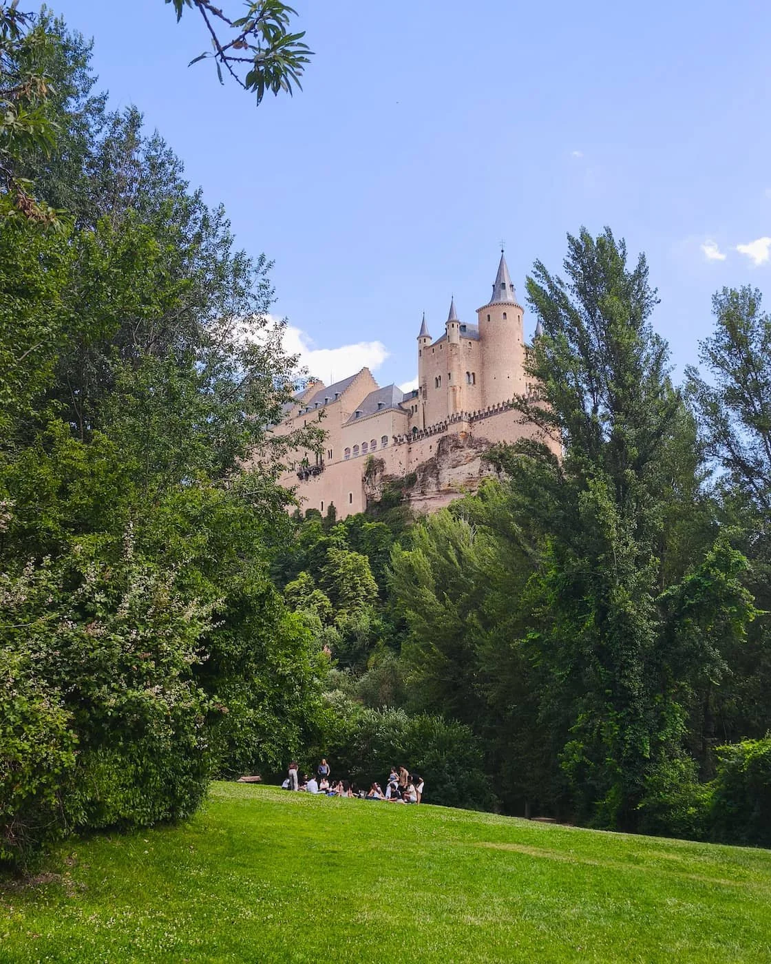 Alcázar of Segovia seen from Mirador de la Pradera de San Marcos below the castle.