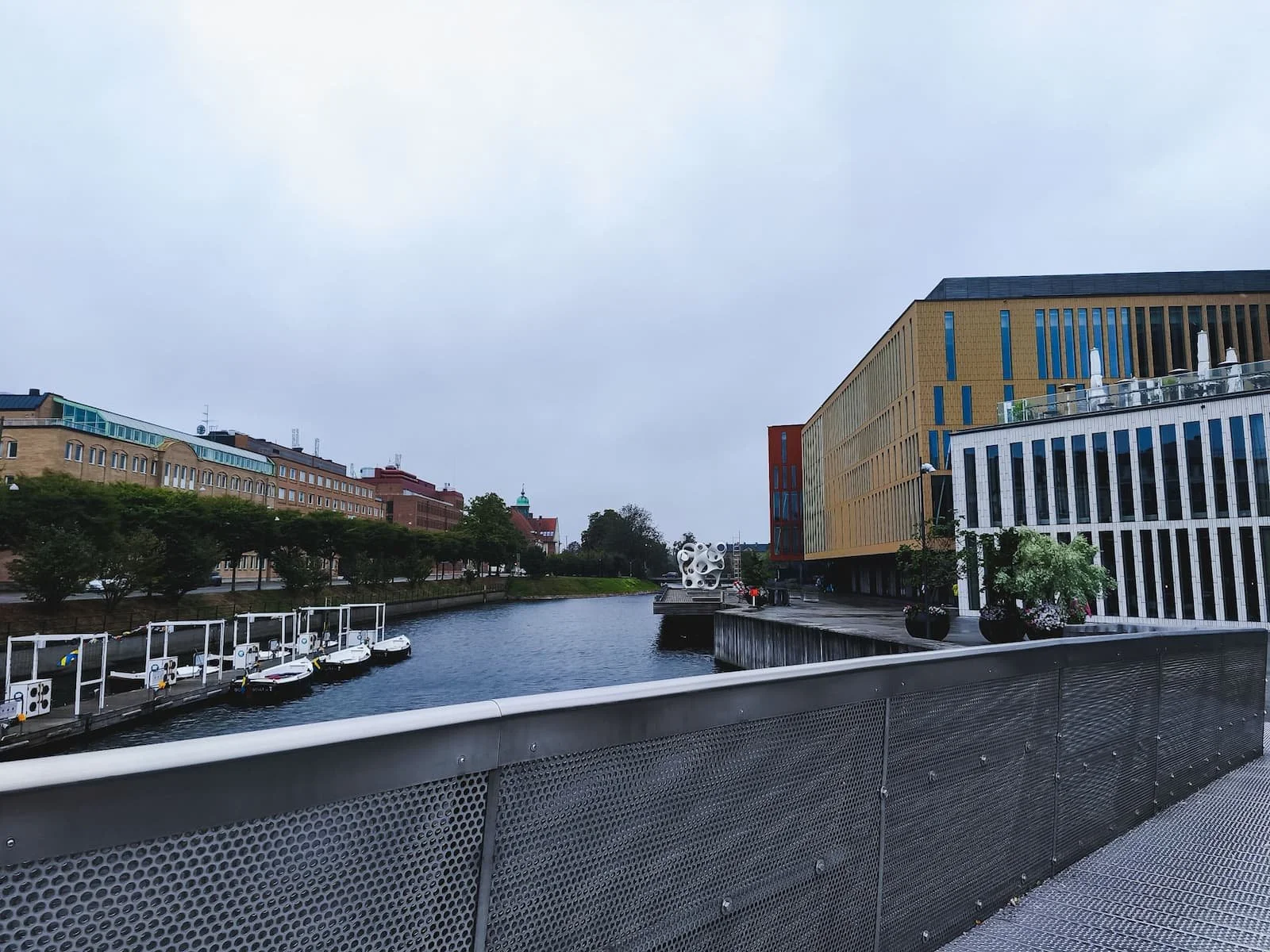 Canal and boats in Malmö on the walk toward Malmö Saluhall