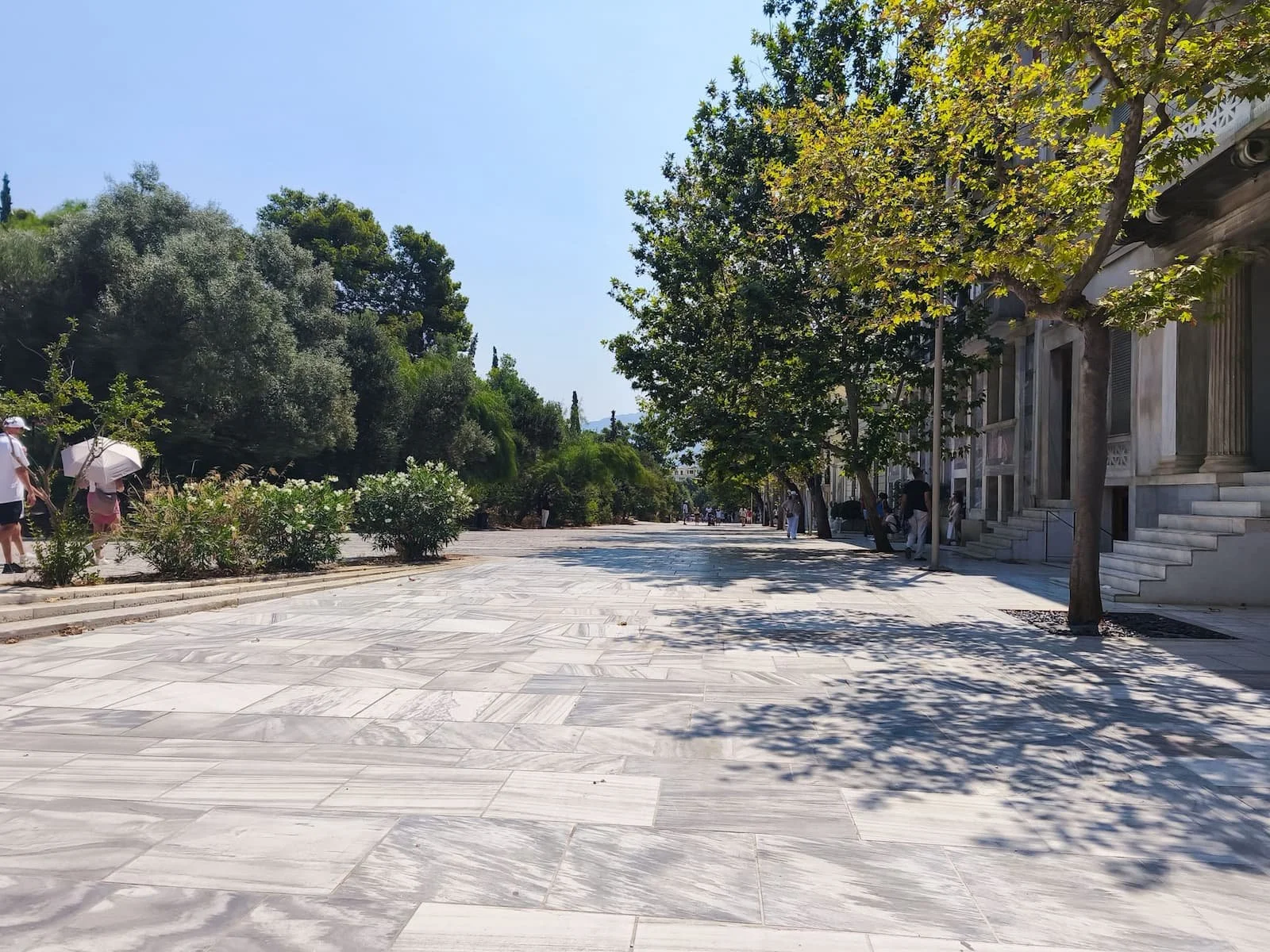 Marble pedestrian walkway leading from the Acropolis toward Koukaki in Athens.