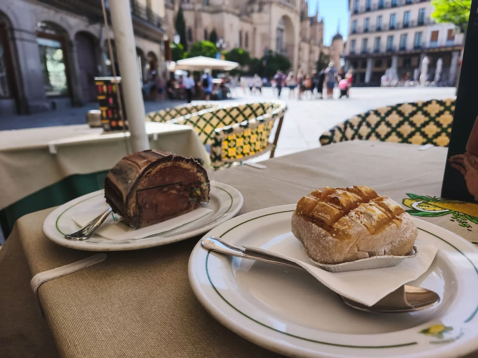 Ponche segoviano dessert served outdoors near Plaza Mayor in Segovia.